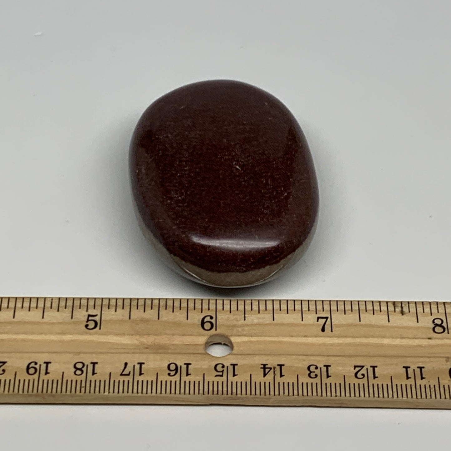 94.9g, 2.4"x1.7"x0.9", Narmada Shiva Lingam Palm-Stone Polished, B29378