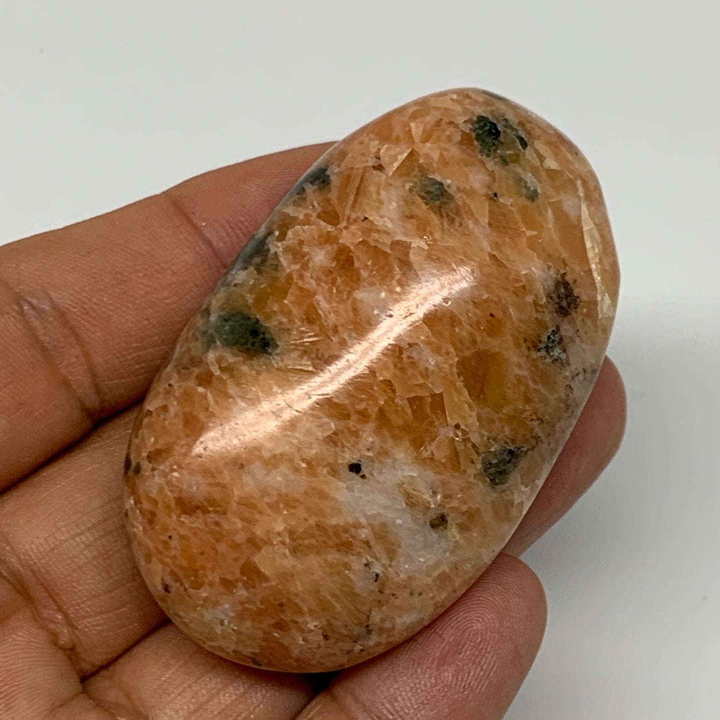 75.4g, 2.4"x1.4"x0.9", Orange Calcite Palm-Stone Crystal Polished Reiki, B16061