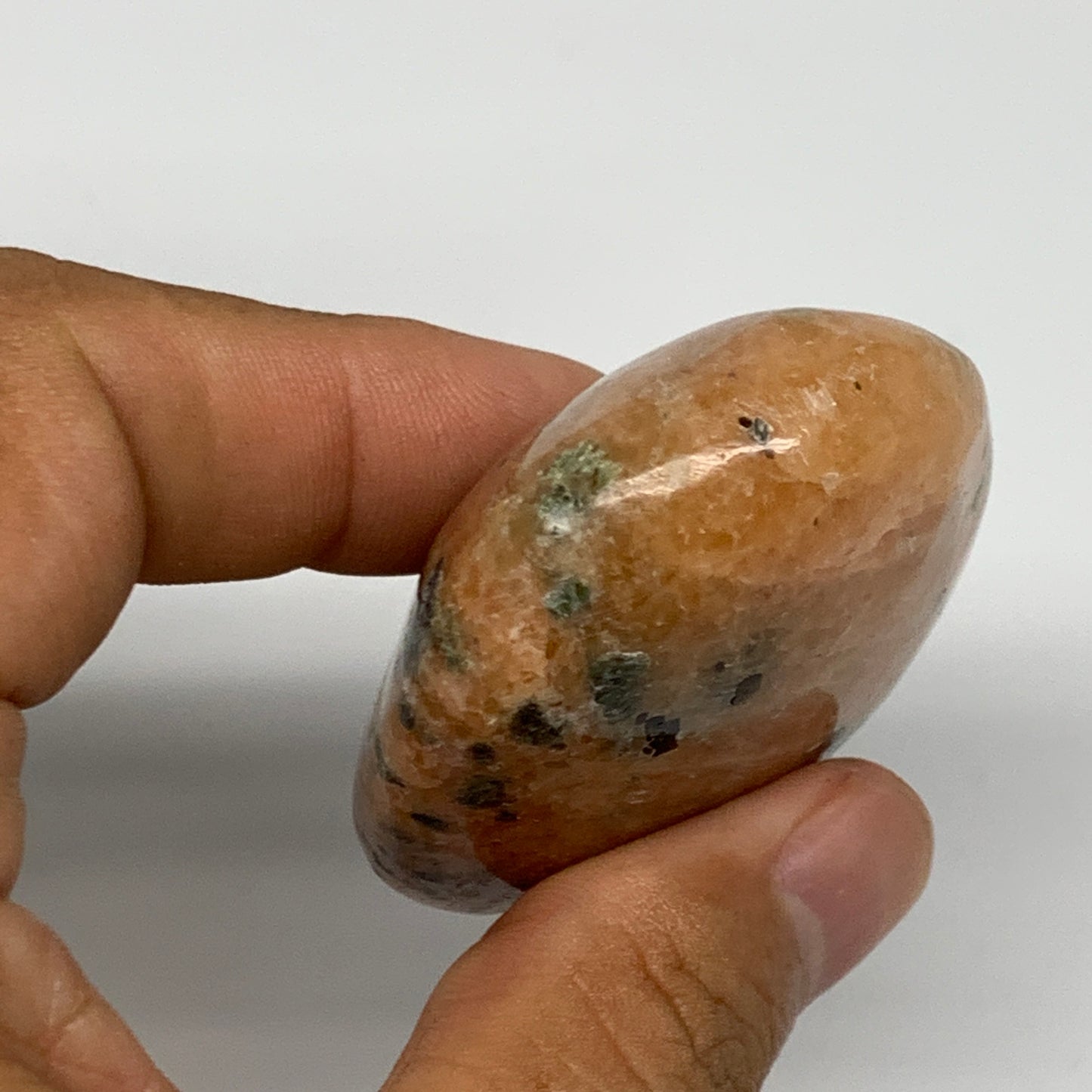 95.6g, 2.5"x1.7"x0.9", Orange Calcite Palm-Stone Crystal Polished Reiki, B16070