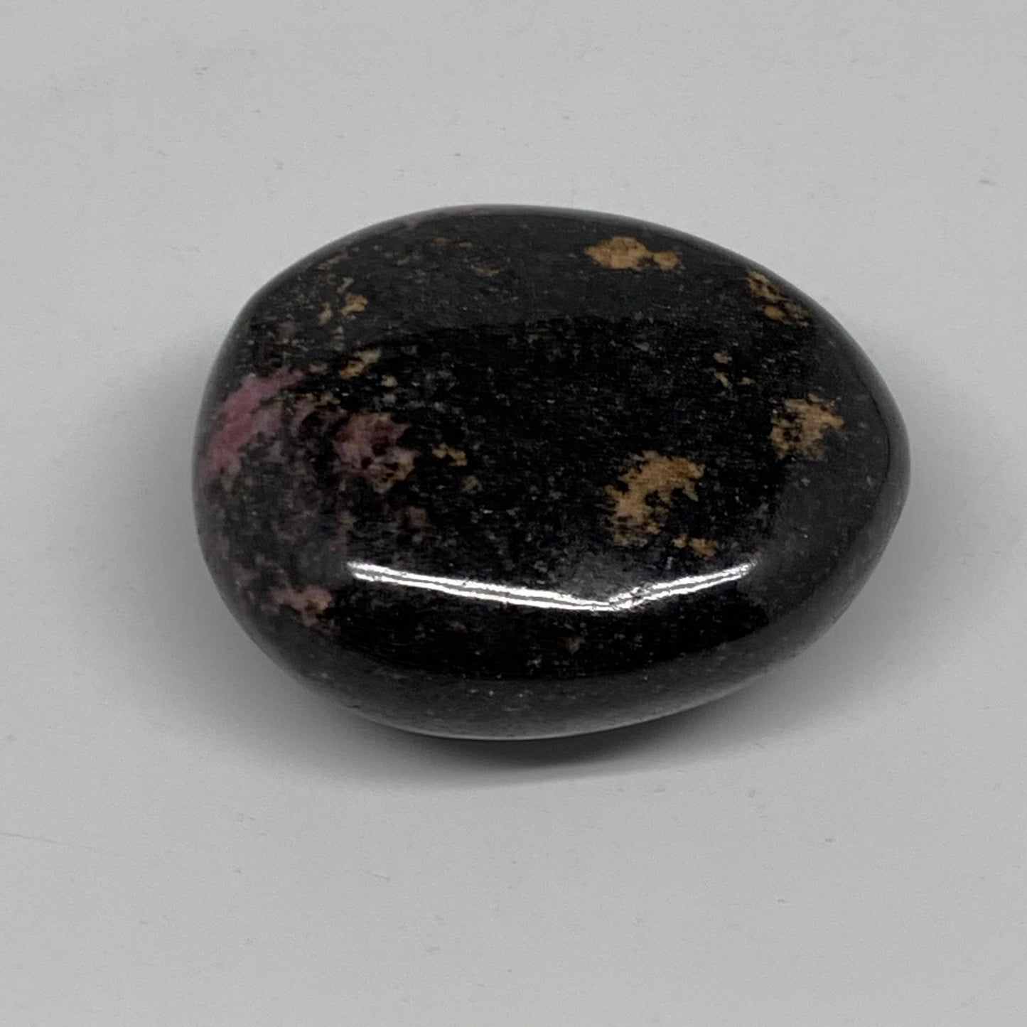 133.7g, 2.2"x1.8"x1.1", Rhodonite Palm-Stone Polished Reiki Madagascar,B12103