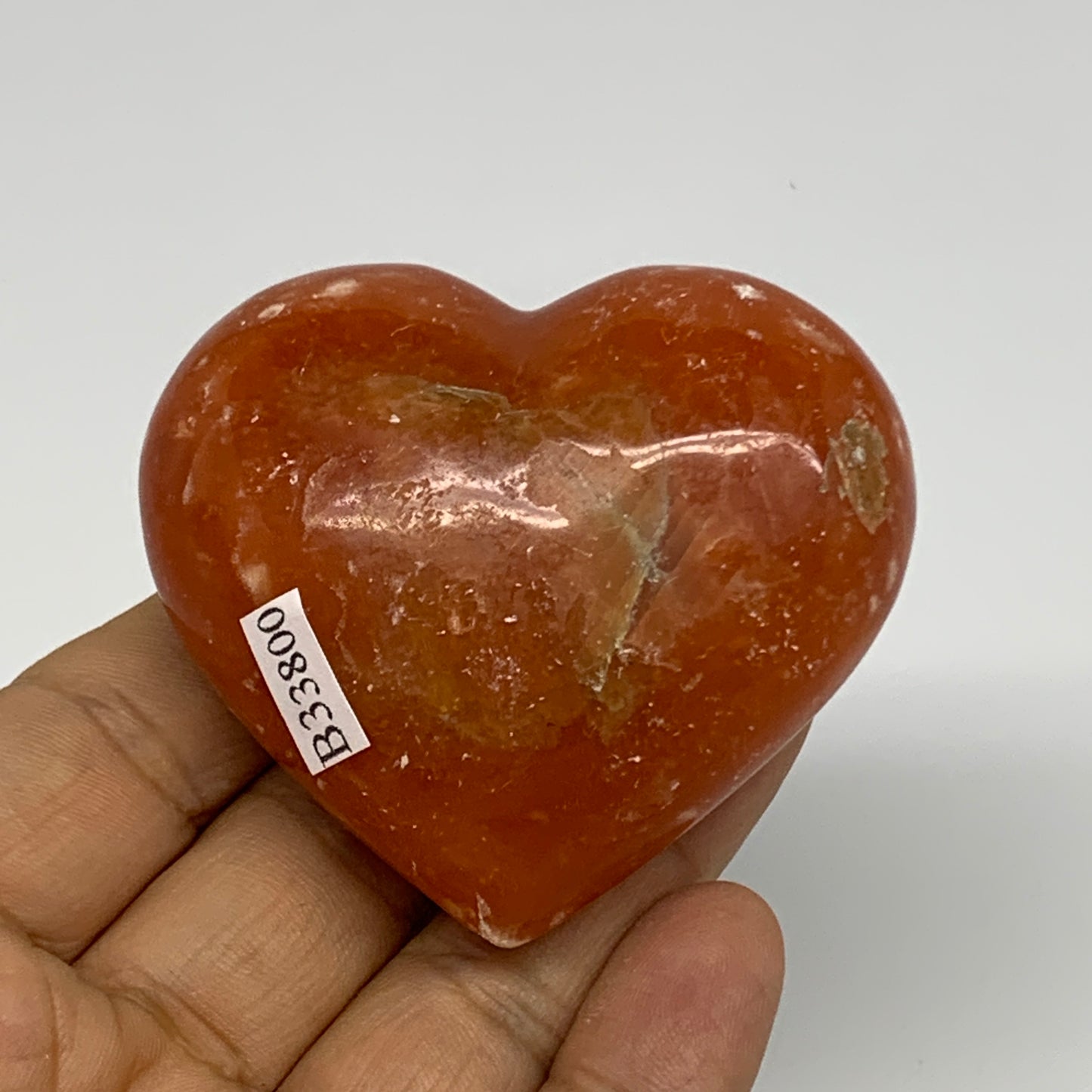 108.9g,2.1"x2.4"x1.1" Orange Calcite Heart Gemstones from Madagascar, B33800
