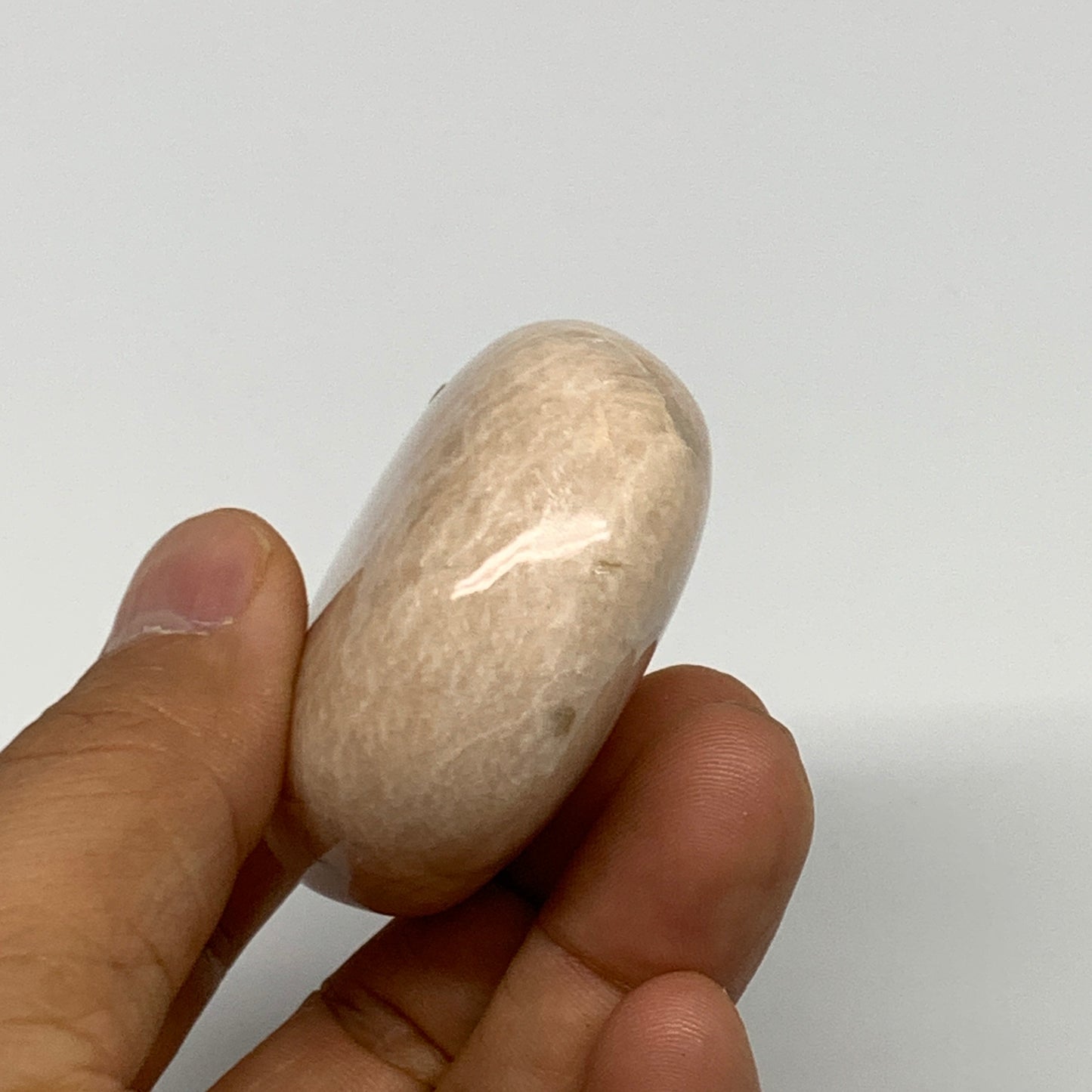 109.4g,2.3"x1.8"x0.9" Peach Moonstone Crystal Palm-Stone Polished Reiki, B27989