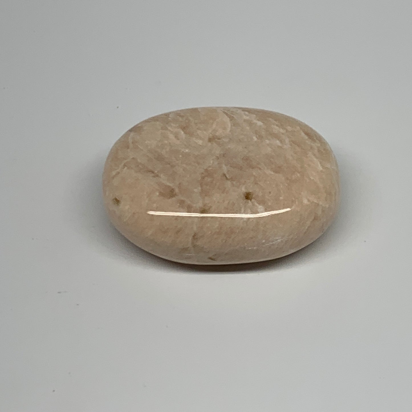 109.4g,2.3"x1.8"x0.9" Peach Moonstone Crystal Palm-Stone Polished Reiki, B27989