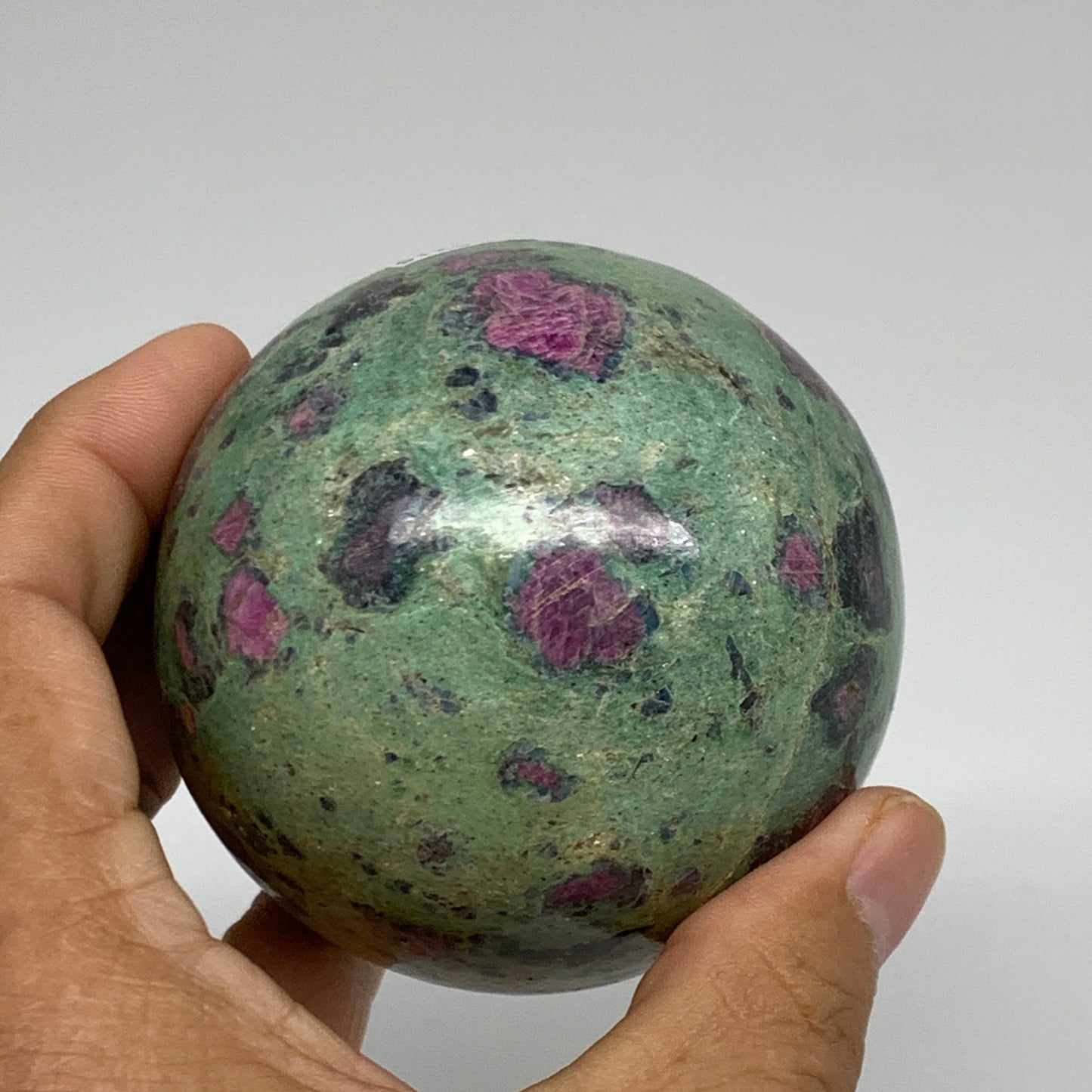 1.3 lbs, 2.8"(71mm), Zoisite with Ruby Sphere Sphere Ball Crystal, B25215