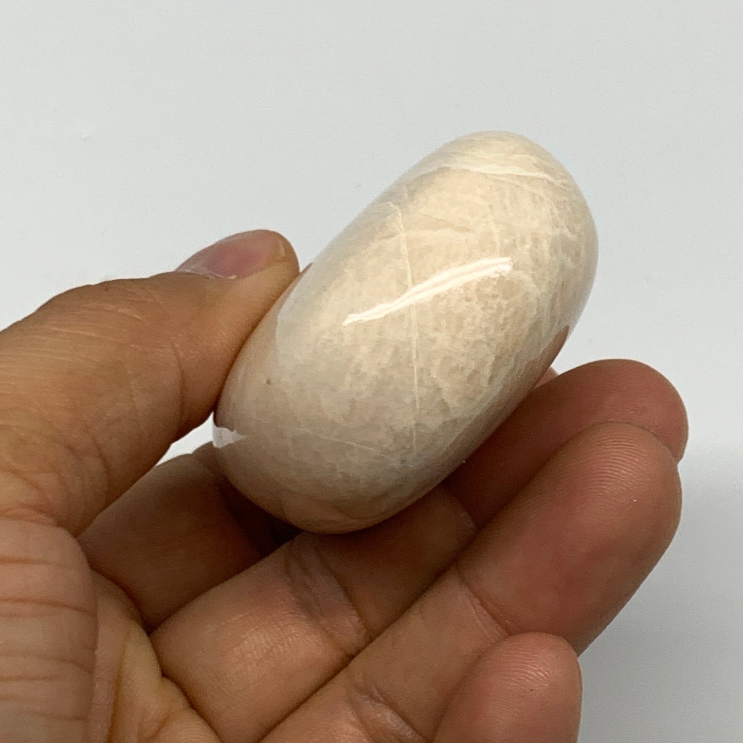 111g,2.3"x1.7"x0.9" Peach Moonstone Crystal Palm-Stone Polished Reiki, B27991