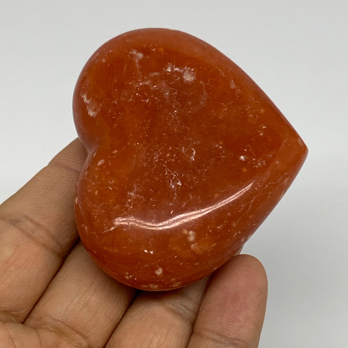 97.7g,2.1"x2.6"x0.9" Orange Calcite Heart Gemstones from Madagascar, B33802