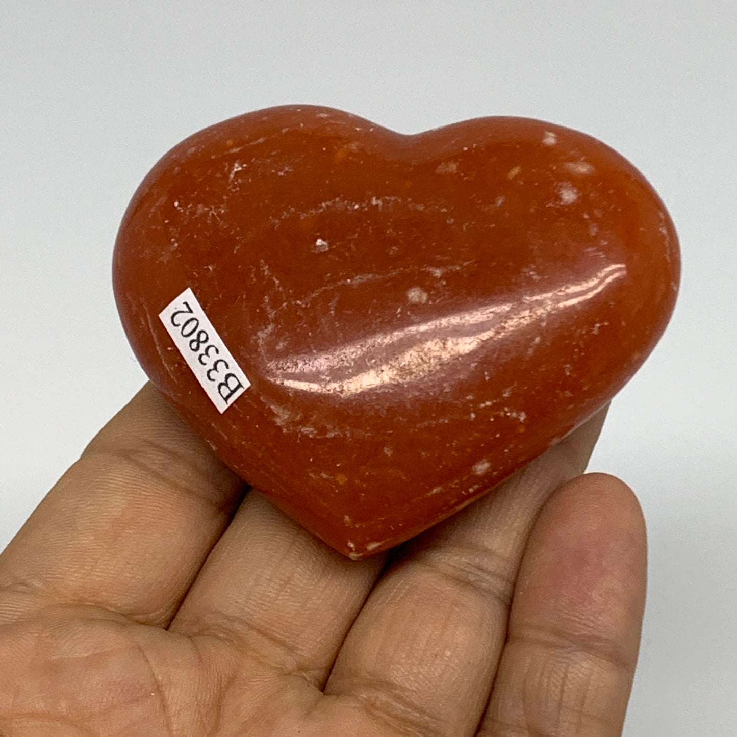 97.7g,2.1"x2.6"x0.9" Orange Calcite Heart Gemstones from Madagascar, B33802