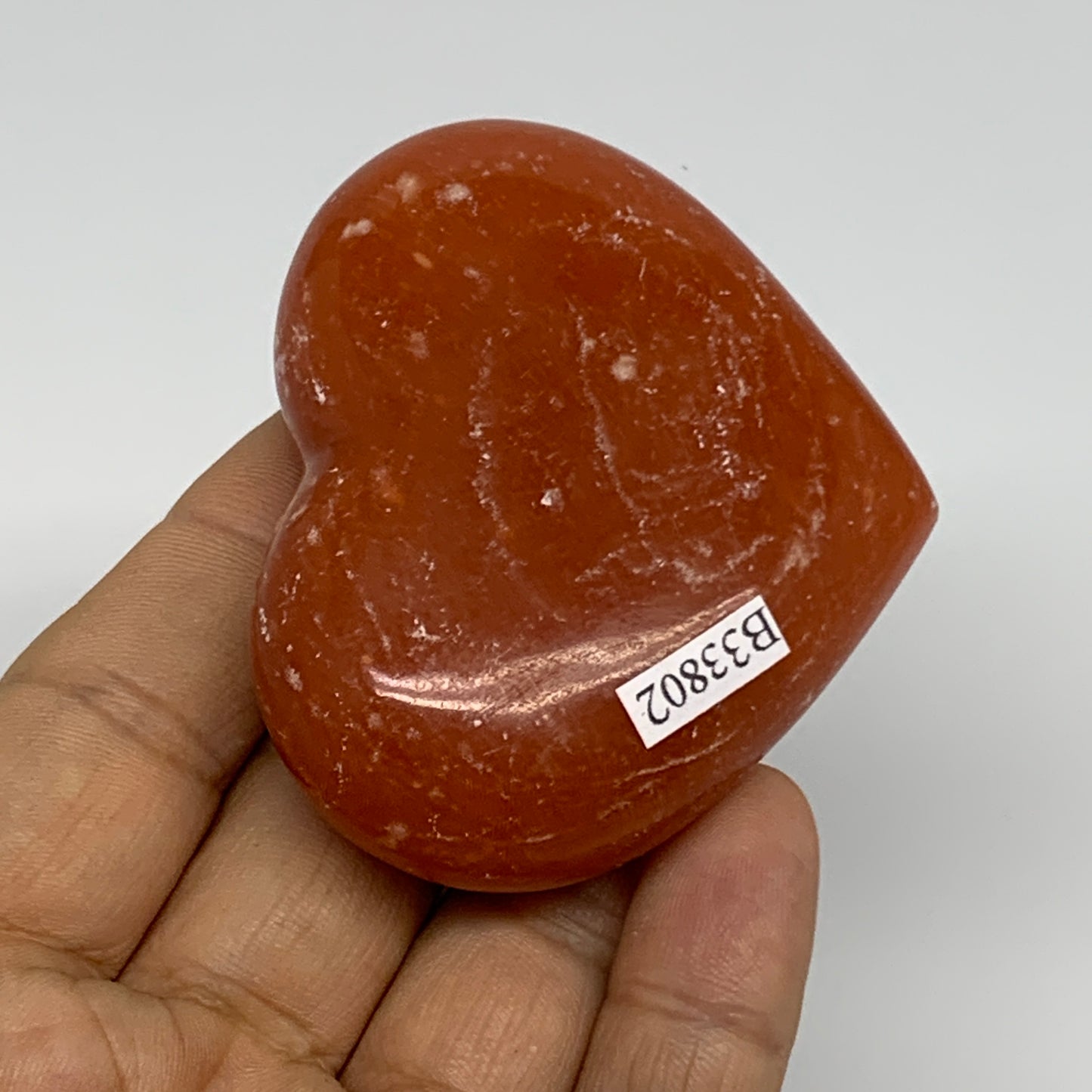 97.7g,2.1"x2.6"x0.9" Orange Calcite Heart Gemstones from Madagascar, B33802