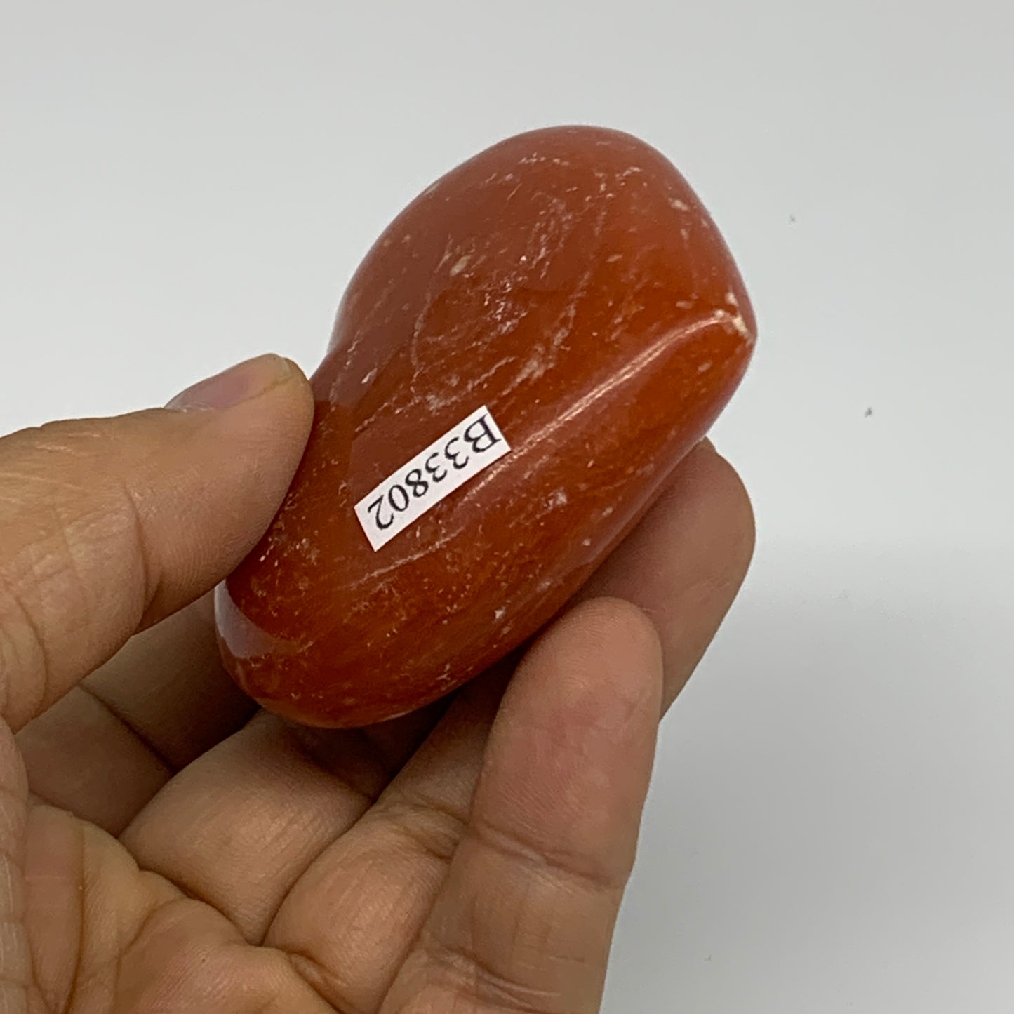 97.7g,2.1"x2.6"x0.9" Orange Calcite Heart Gemstones from Madagascar, B33802