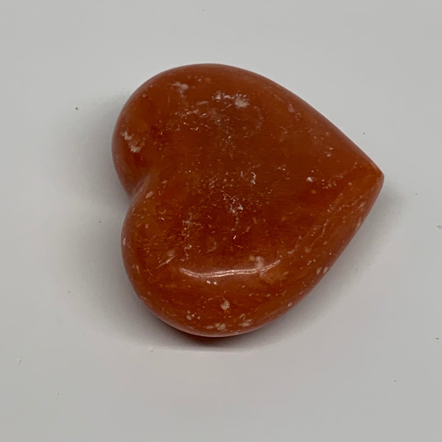 97.7g,2.1"x2.6"x0.9" Orange Calcite Heart Gemstones from Madagascar, B33802