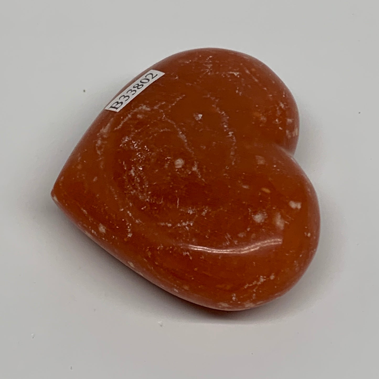 97.7g,2.1"x2.6"x0.9" Orange Calcite Heart Gemstones from Madagascar, B33802