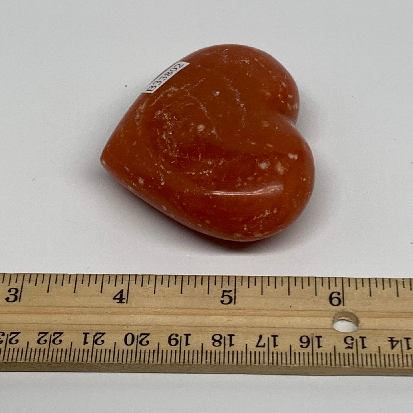 97.7g,2.1"x2.6"x0.9" Orange Calcite Heart Gemstones from Madagascar, B33802