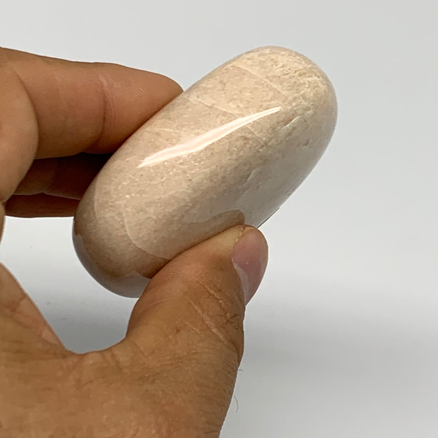 100.3g,2.2"x1.7"x0.9" Peach Moonstone Crystal Palm-Stone Polished Reiki, B27992