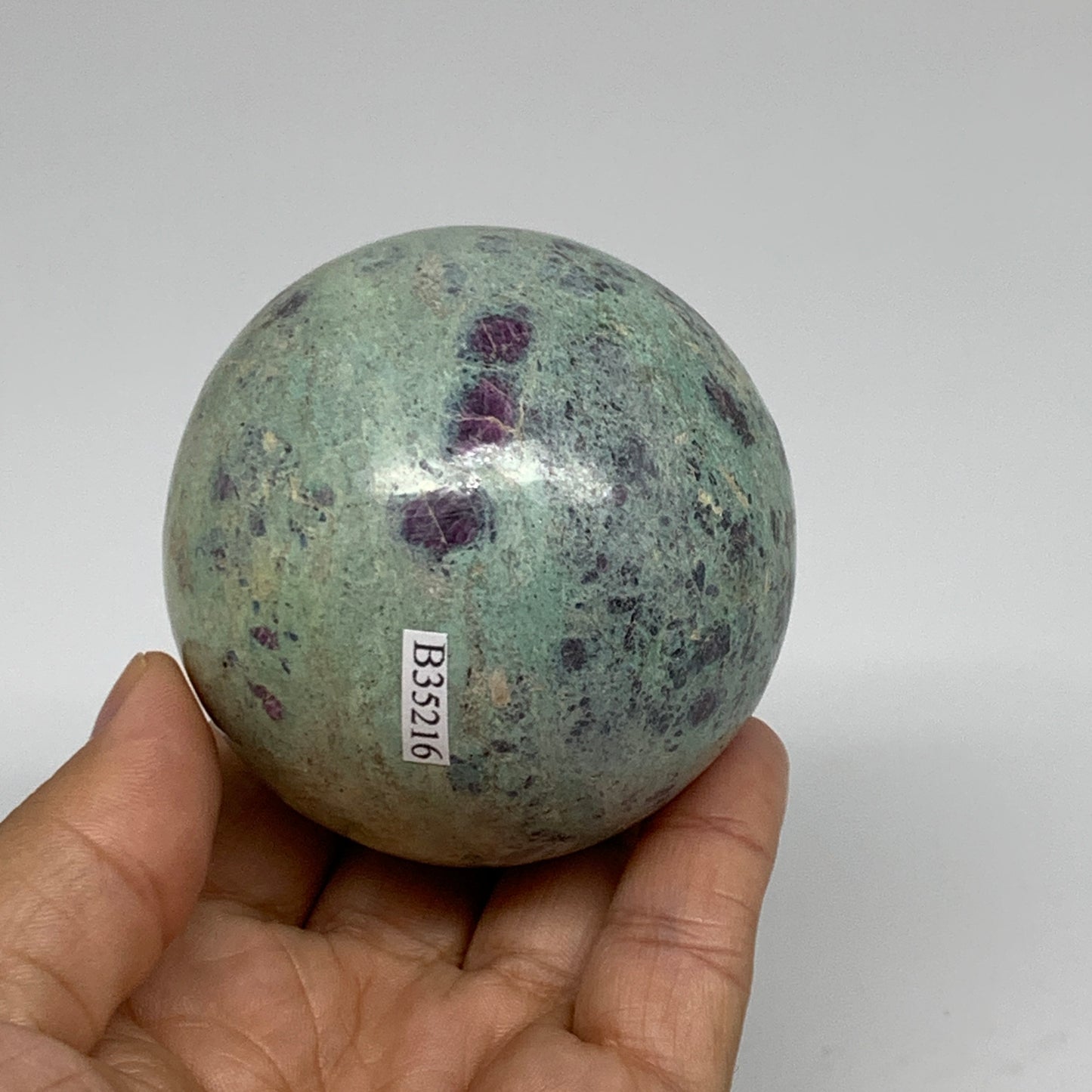 0.98 lbs, 2.6"(65mm), Zoisite with Ruby Sphere Sphere Ball Crystal, B25216