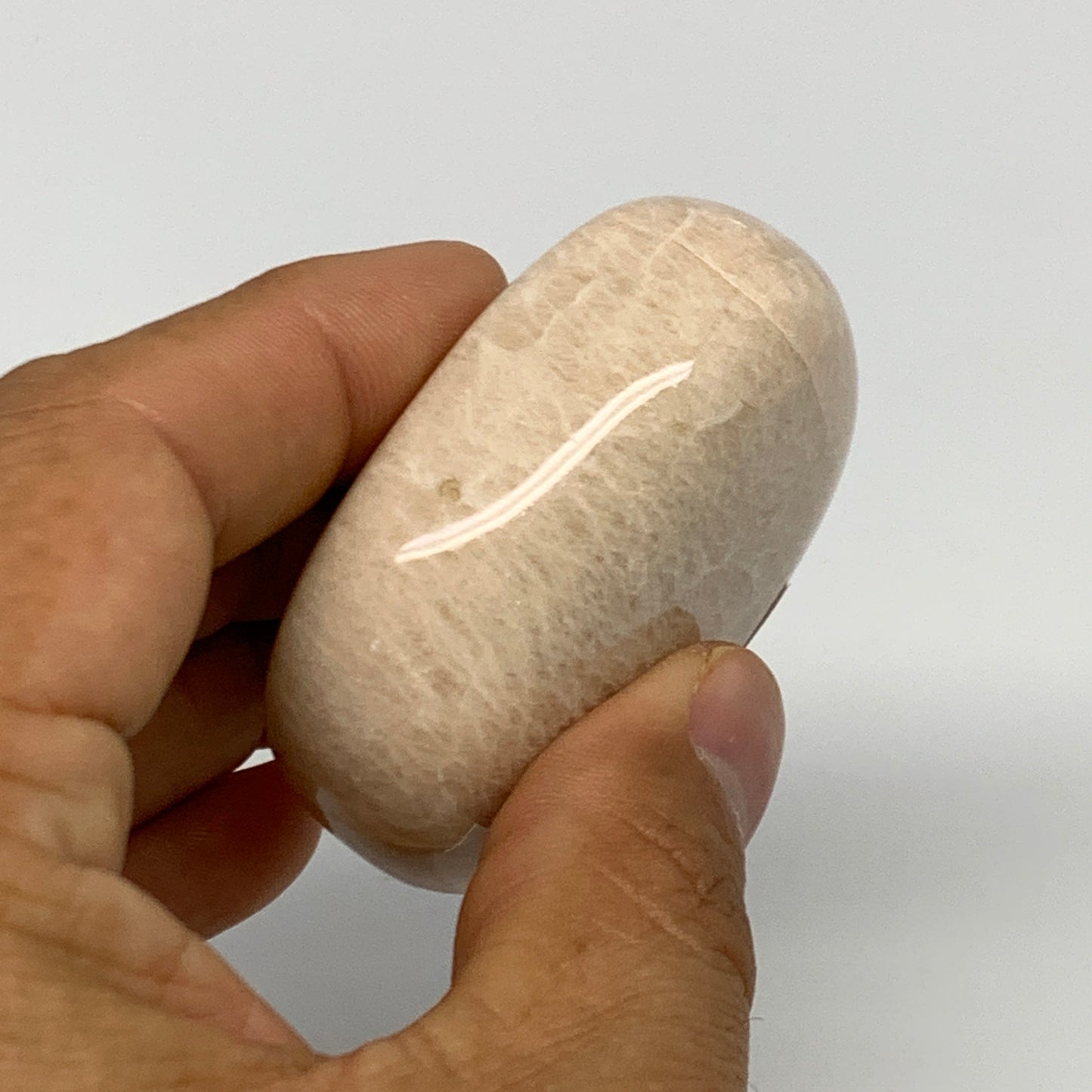 99.4g,2.1"x1.7"x0.9" Peach Moonstone Crystal Palm-Stone Polished Reiki, B27993