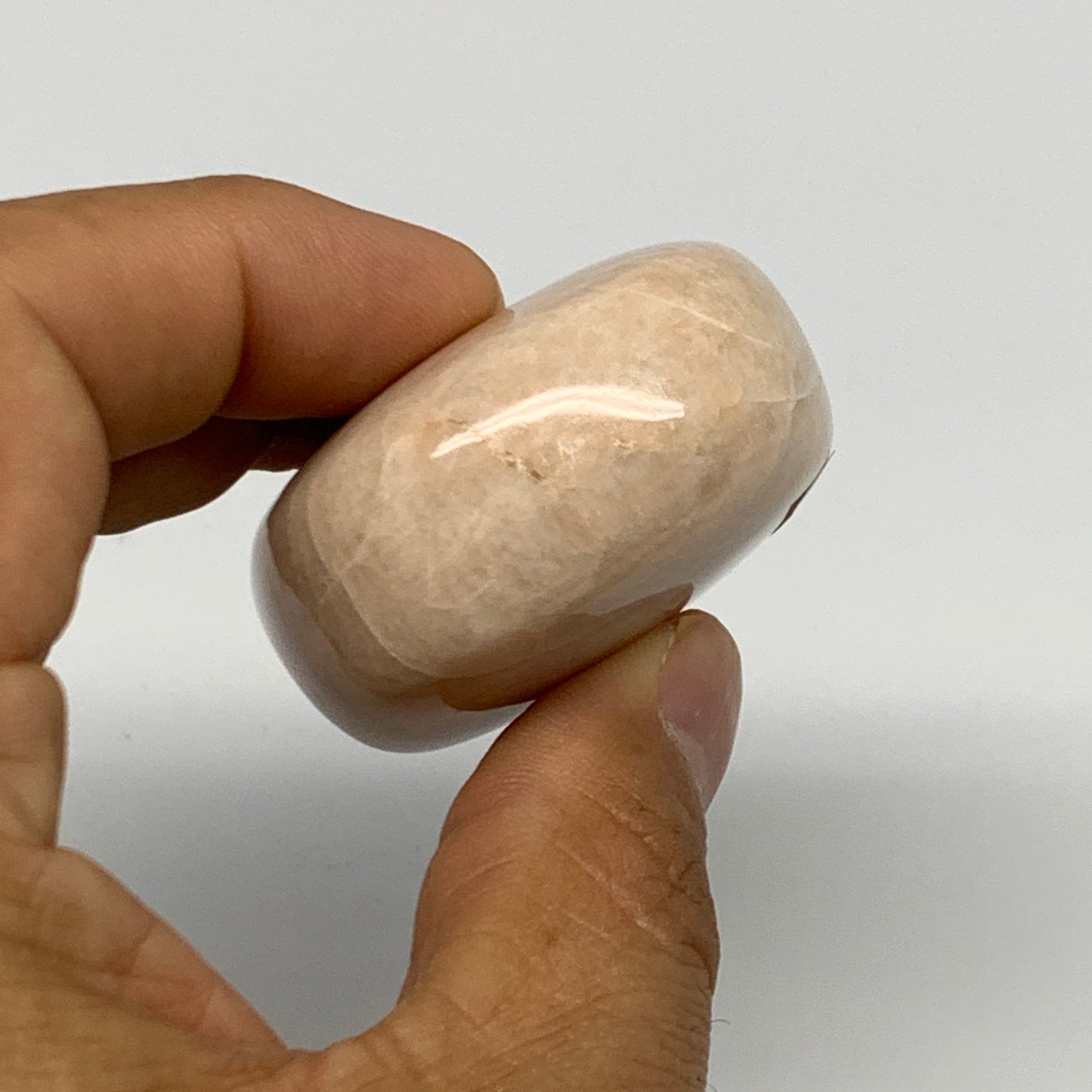 99.4g,2.1"x1.7"x0.9" Peach Moonstone Crystal Palm-Stone Polished Reiki, B27993