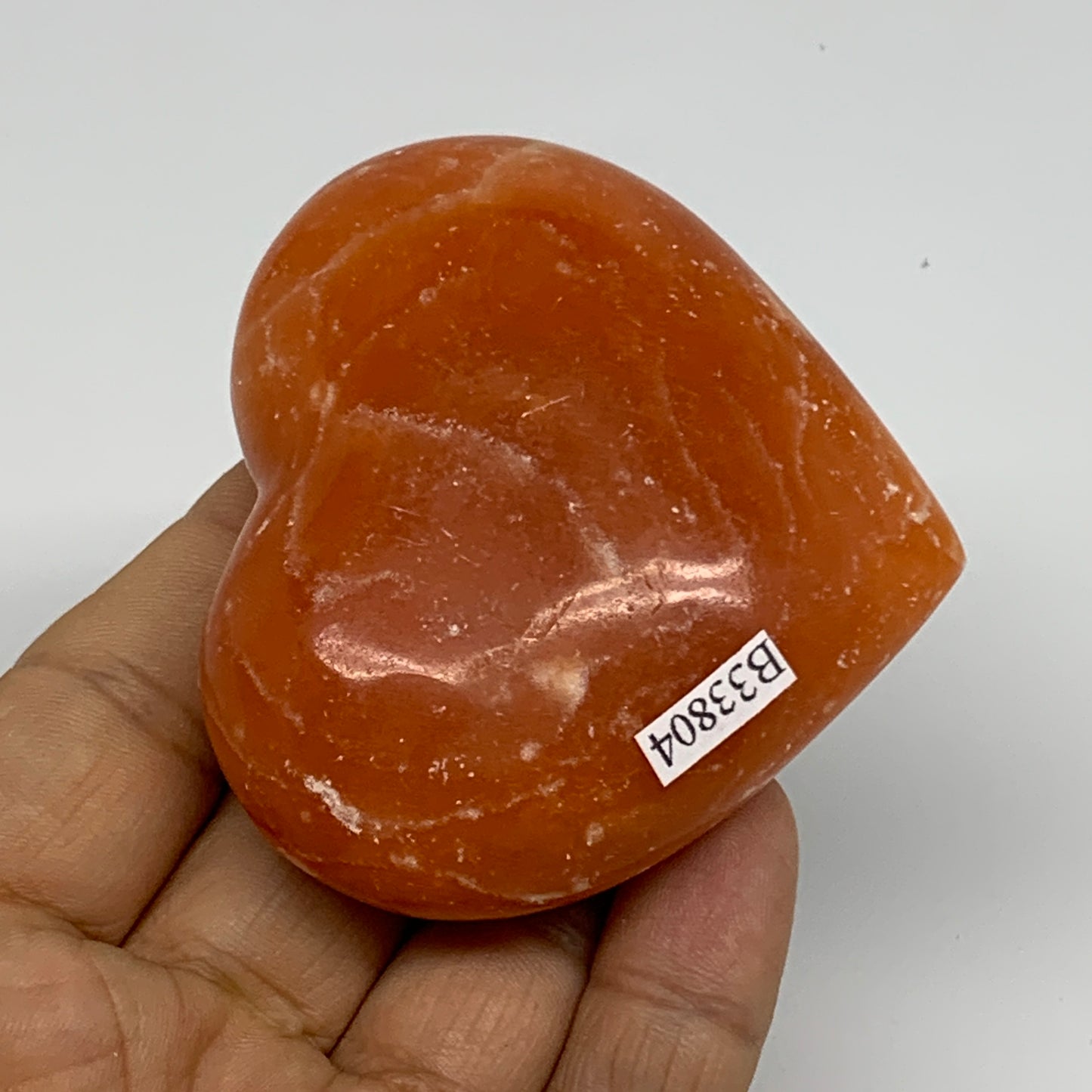 124.7g,2.4"x2.6"x1" Orange Calcite Heart Gemstones from Madagascar, B33804