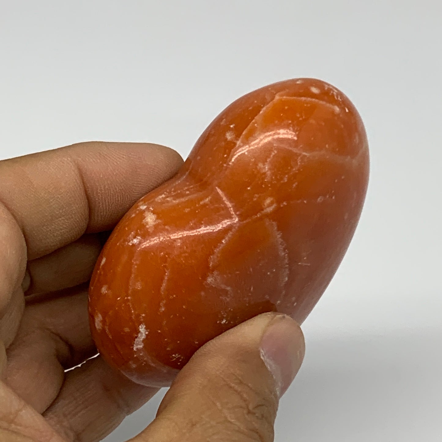124.7g,2.4"x2.6"x1" Orange Calcite Heart Gemstones from Madagascar, B33804