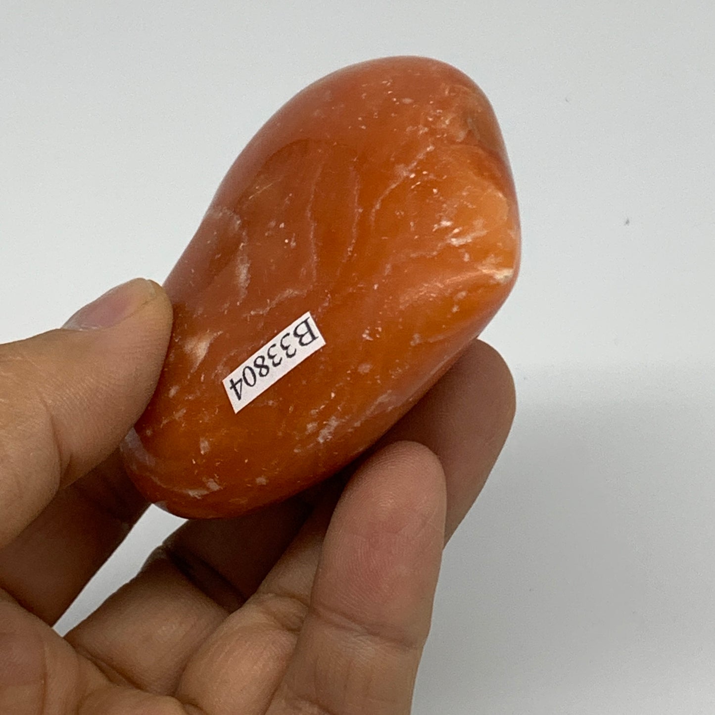 124.7g,2.4"x2.6"x1" Orange Calcite Heart Gemstones from Madagascar, B33804