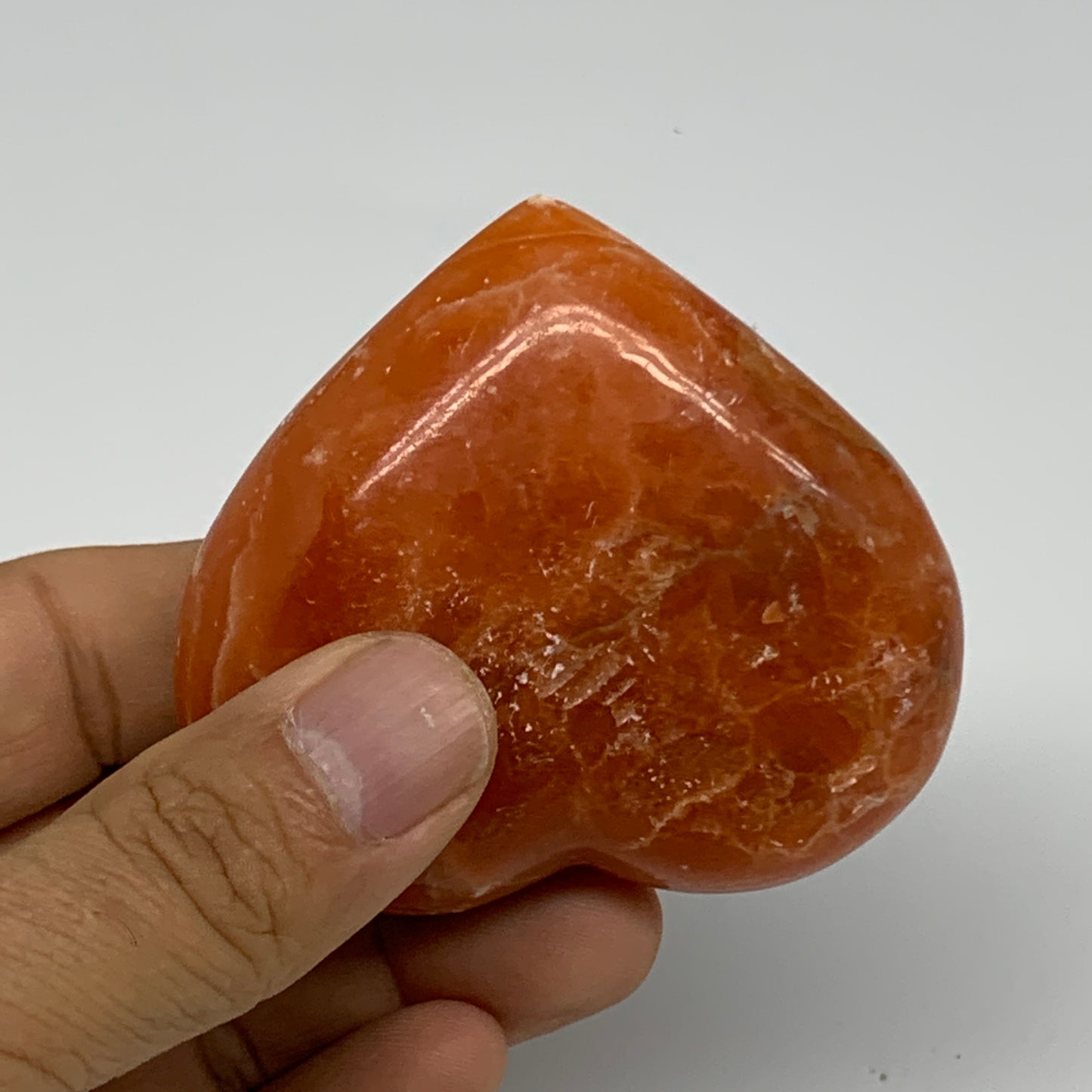 124.7g,2.4"x2.6"x1" Orange Calcite Heart Gemstones from Madagascar, B33804