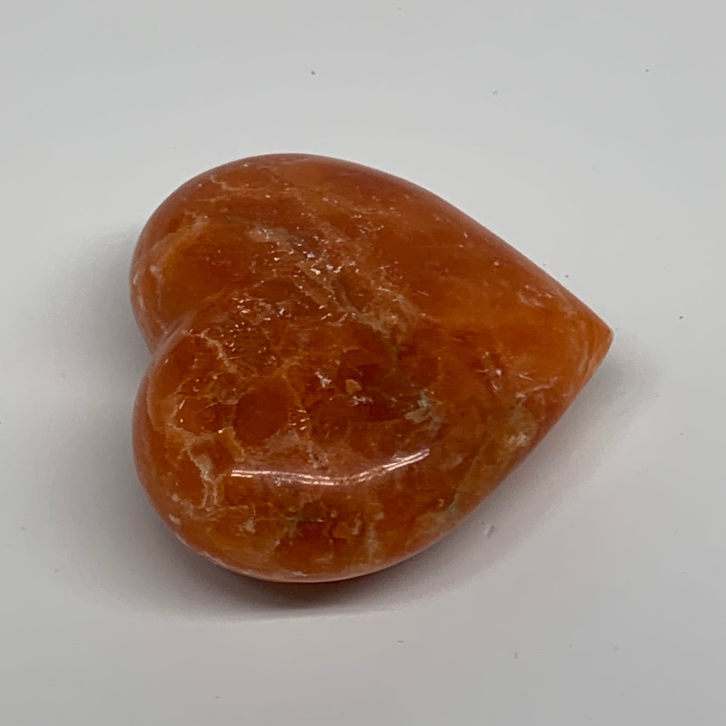 124.7g,2.4"x2.6"x1" Orange Calcite Heart Gemstones from Madagascar, B33804