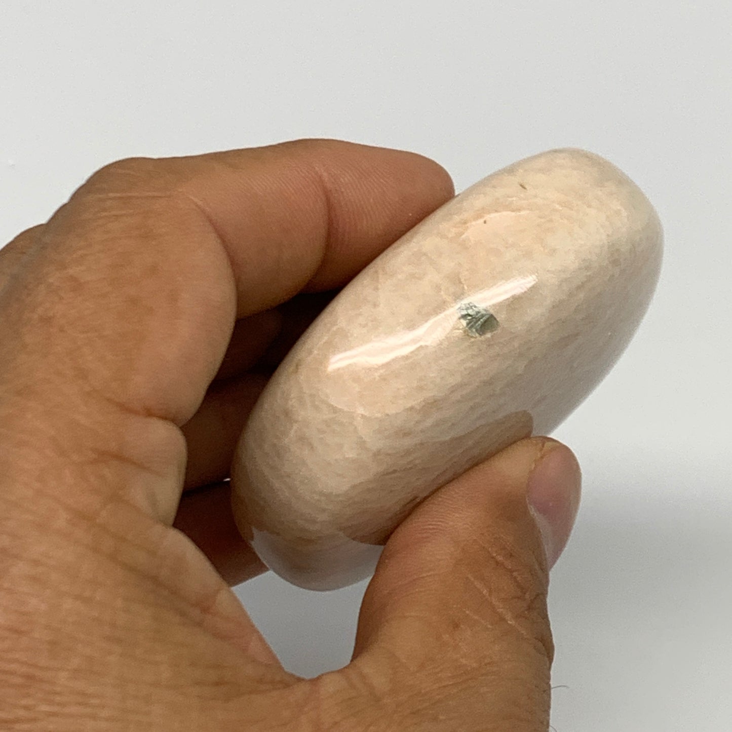 96.9g,2.3"x1.8"x0.8" Peach Moonstone Crystal Palm-Stone Polished Reiki, B27994