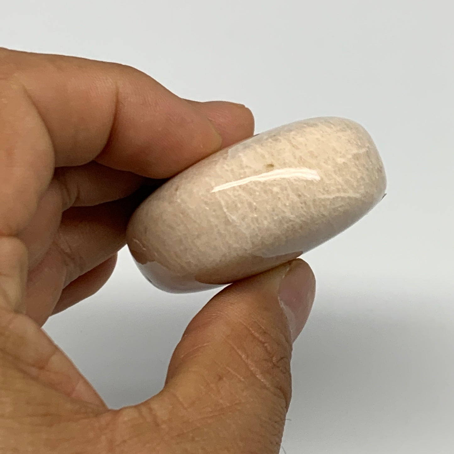 96.9g,2.3"x1.8"x0.8" Peach Moonstone Crystal Palm-Stone Polished Reiki, B27994