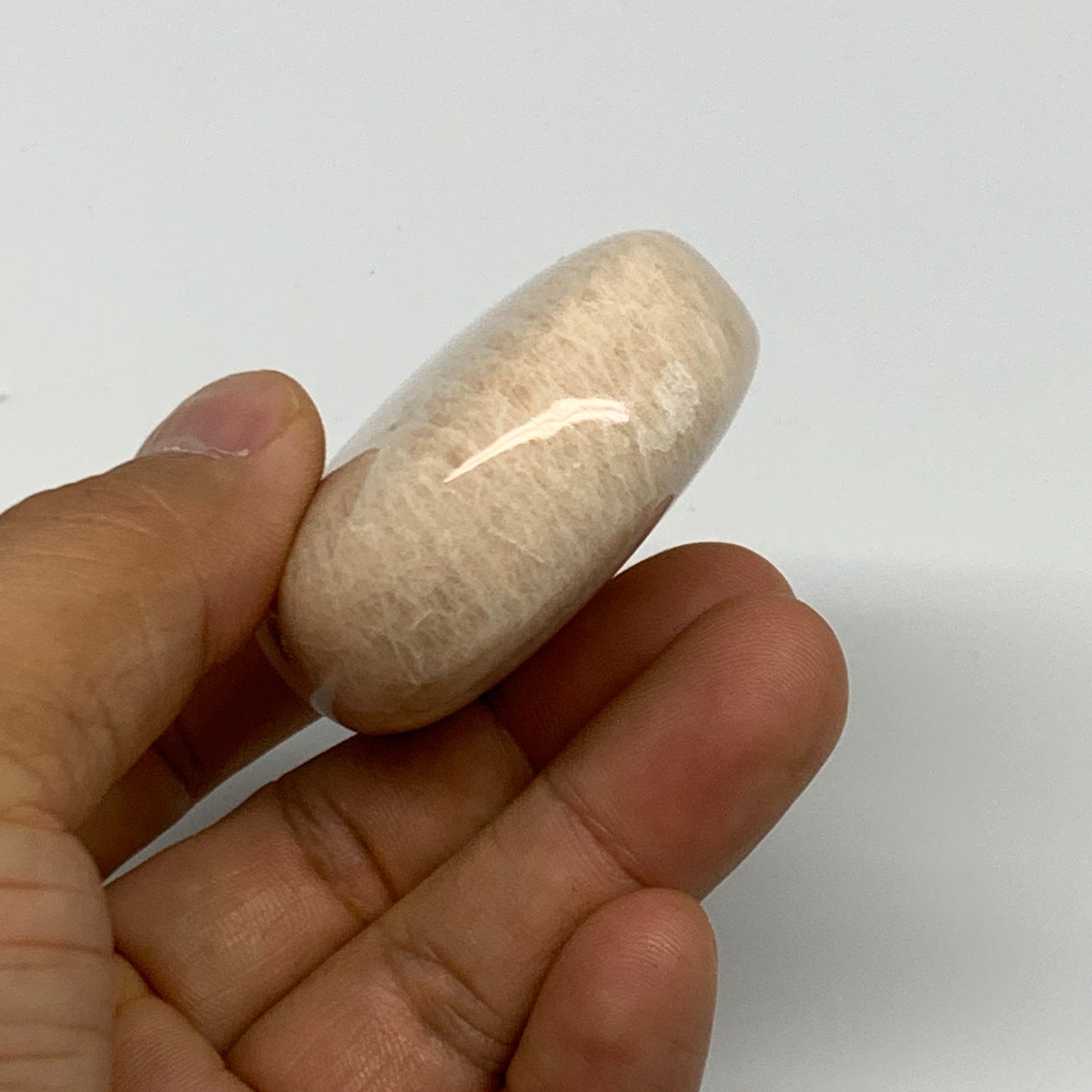 96.9g,2.3"x1.8"x0.8" Peach Moonstone Crystal Palm-Stone Polished Reiki, B27994