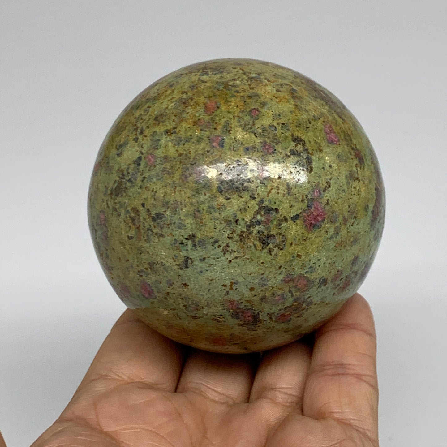 1.15 lbs, 2.7"(69mm), Zoisite with Ruby Sphere Sphere Ball Crystal, B25218
