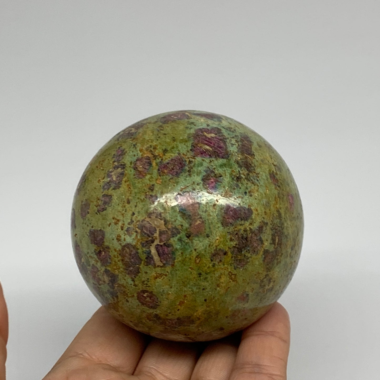 1.15 lbs, 2.7"(69mm), Zoisite with Ruby Sphere Sphere Ball Crystal, B25218