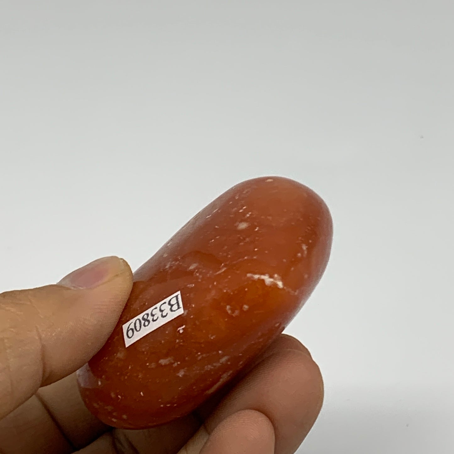 99.9g,2"x2.4"x1" Orange Calcite Heart Gemstones from Madagascar, B33809