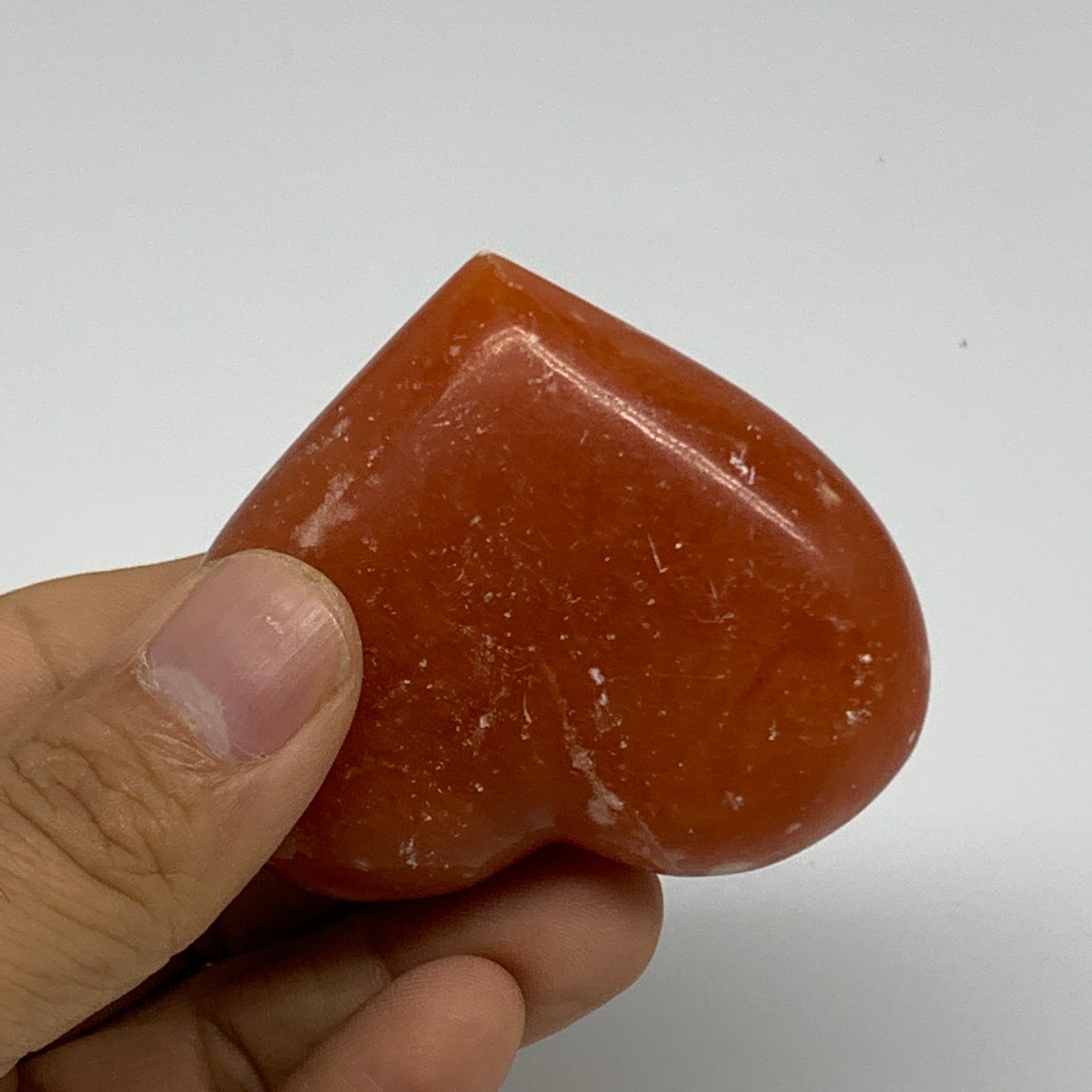 99.9g,2"x2.4"x1" Orange Calcite Heart Gemstones from Madagascar, B33809