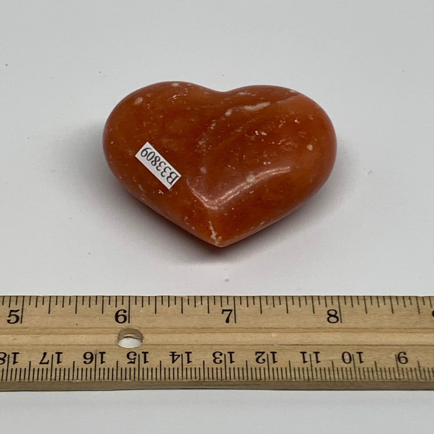 99.9g,2"x2.4"x1" Orange Calcite Heart Gemstones from Madagascar, B33809