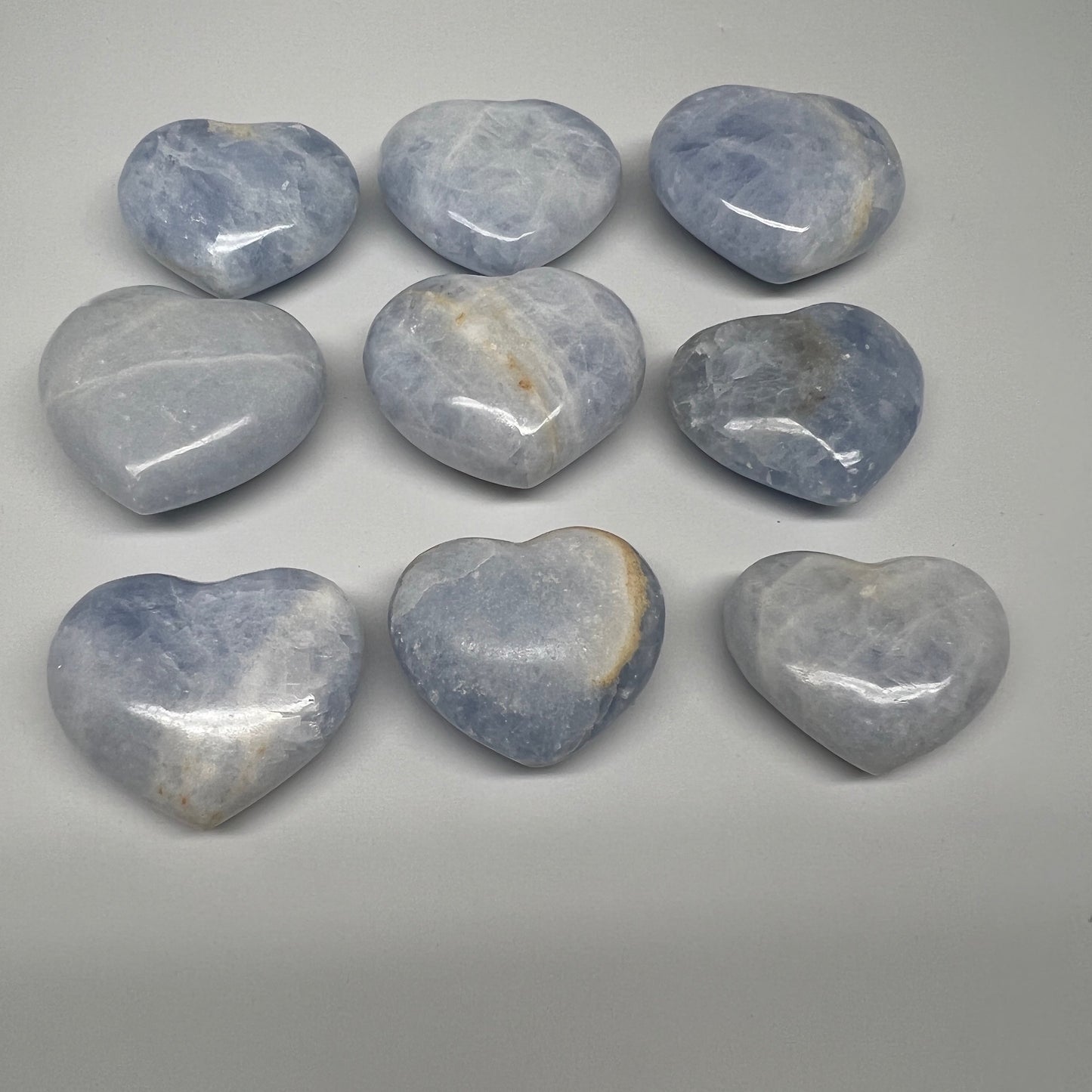 1040g (2.2 lbs) , 9 pcs, 1.7"- 2.3", Blue Calcite Hearts from Madagascar, B20854