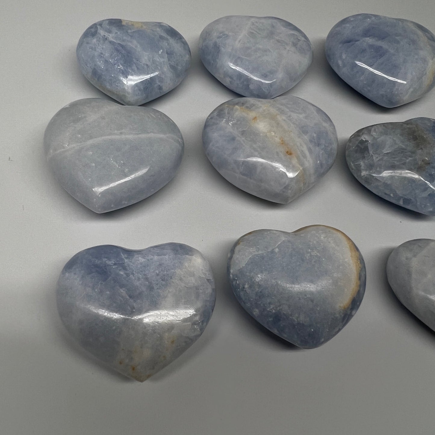 1040g (2.2 lbs) , 9 pcs, 1.7"- 2.3", Blue Calcite Hearts from Madagascar, B20854