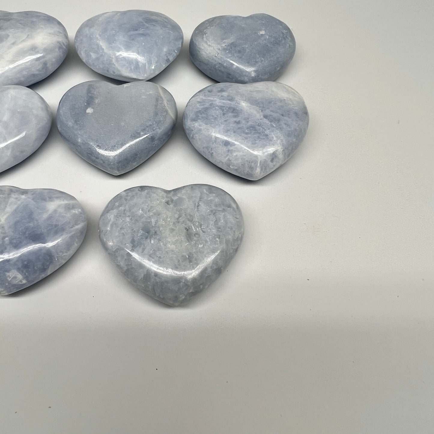 1025g (2.2 lbs) , 8 pcs, 1.9"- 2.2", Blue Calcite Hearts from Madagascar, B20855