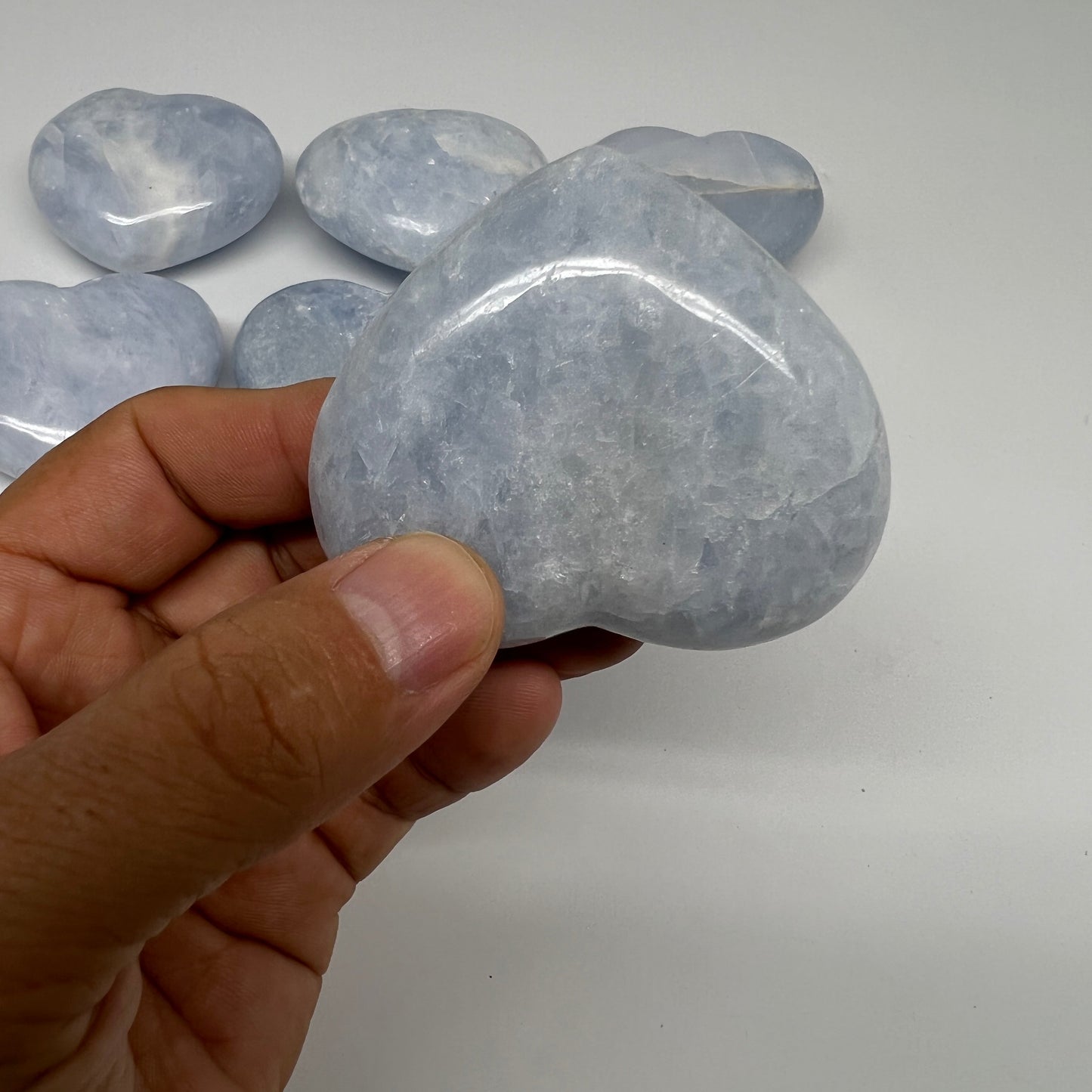 1025g (2.2 lbs) , 8 pcs, 1.9"- 2.2", Blue Calcite Hearts from Madagascar, B20855