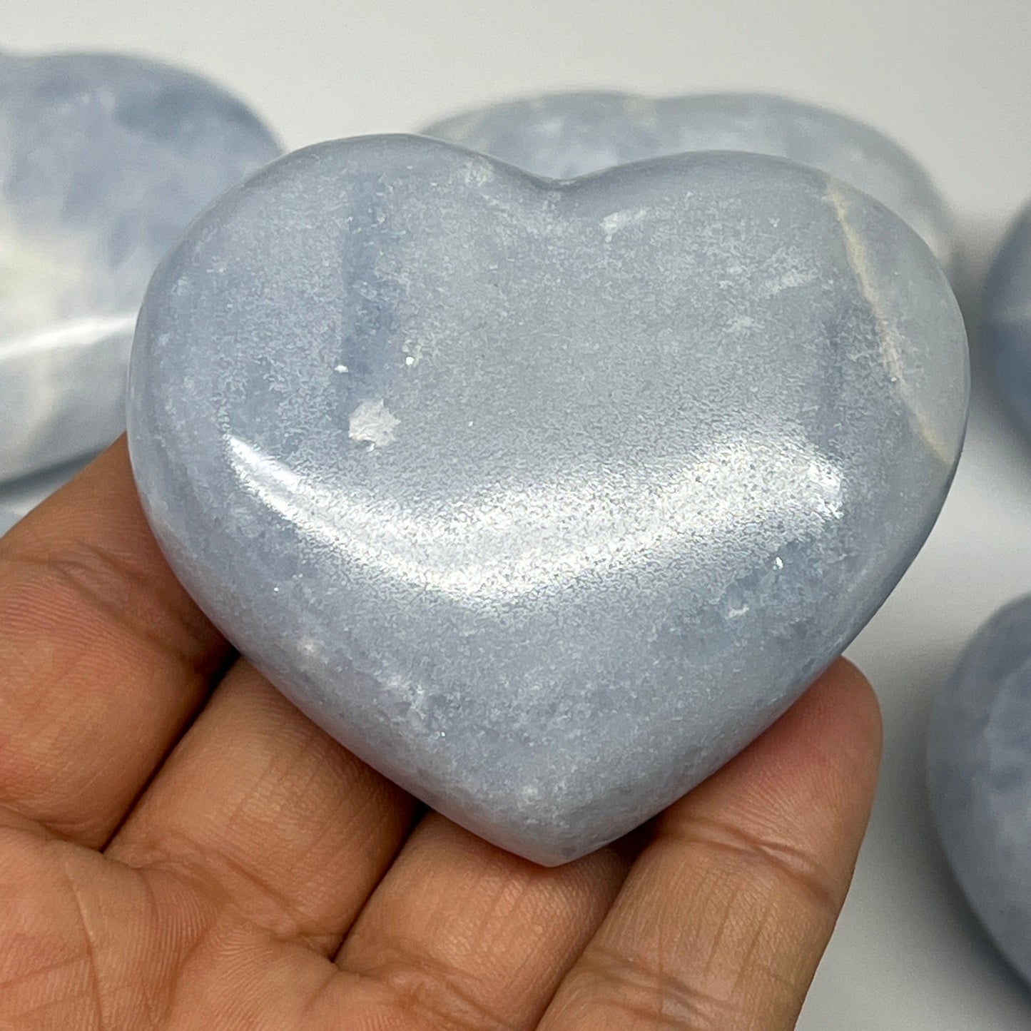 1025g (2.2 lbs) , 8 pcs, 1.9"- 2.2", Blue Calcite Hearts from Madagascar, B20855