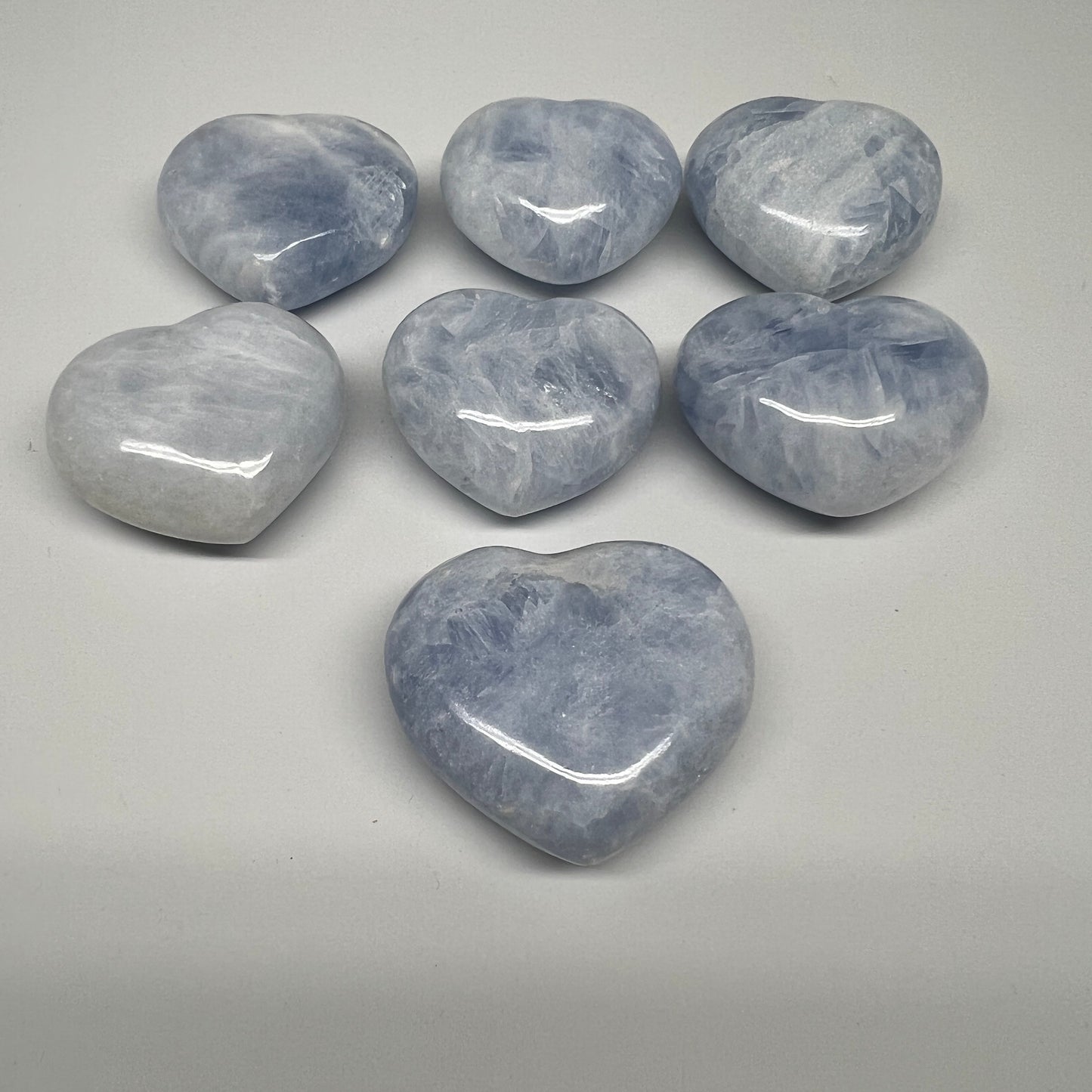 1010g (2.2 lbs) , 7 pcs, 2"- 2.3", Blue Calcite Hearts from Madagascar, B20856