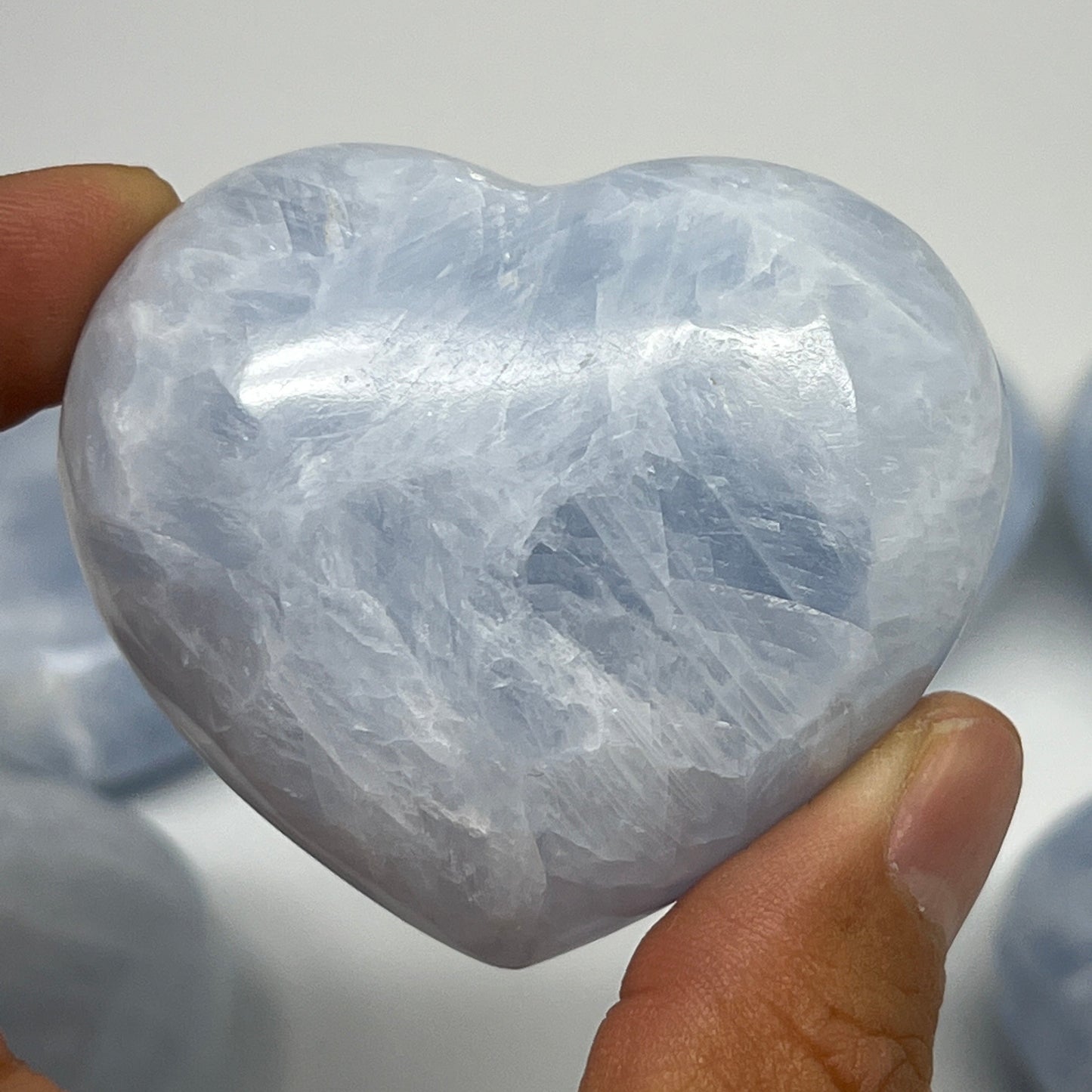 1010g (2.2 lbs) , 7 pcs, 2"- 2.3", Blue Calcite Hearts from Madagascar, B20856