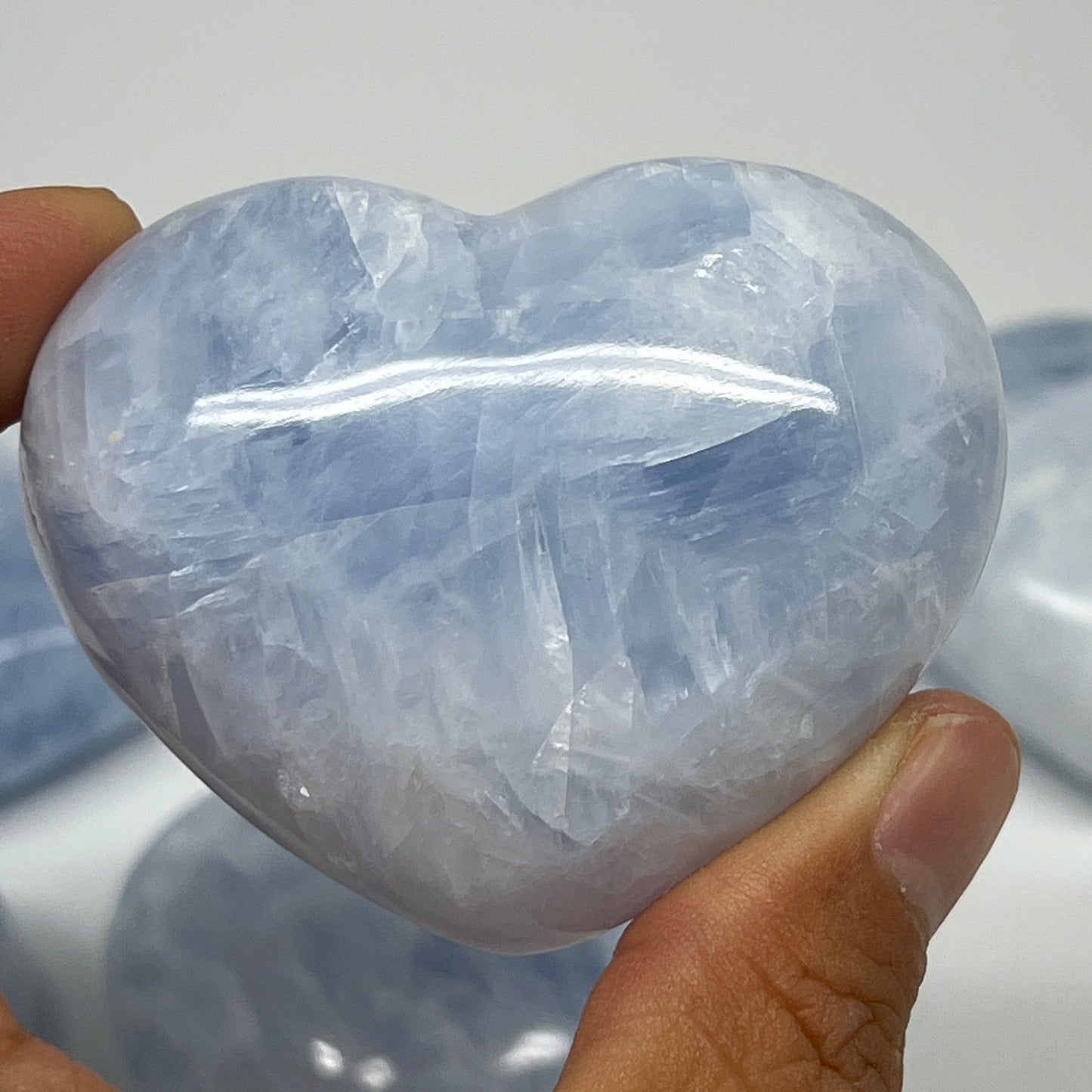 1010g (2.2 lbs) , 7 pcs, 2"- 2.3", Blue Calcite Hearts from Madagascar, B20856