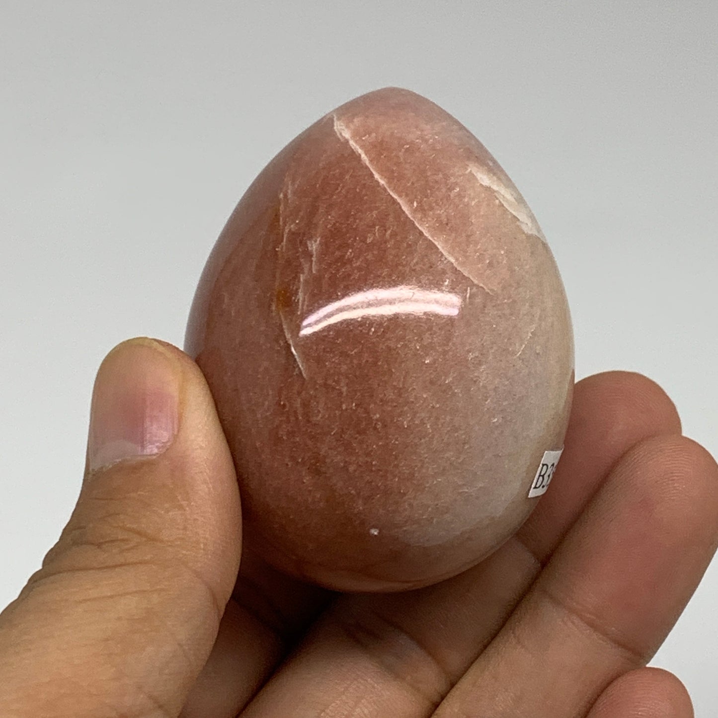 142.1g, 2.2"x1.7", Natural Red Aventurine Egg Polished Gemstone, B35343