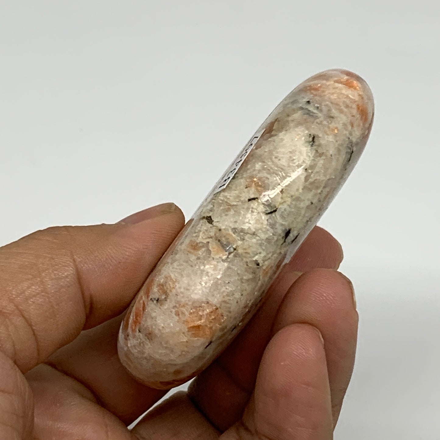 108.4g, 2.8"x1.8"x0.8", Natural Sunstone Palm-Stone Polished from India, B34597