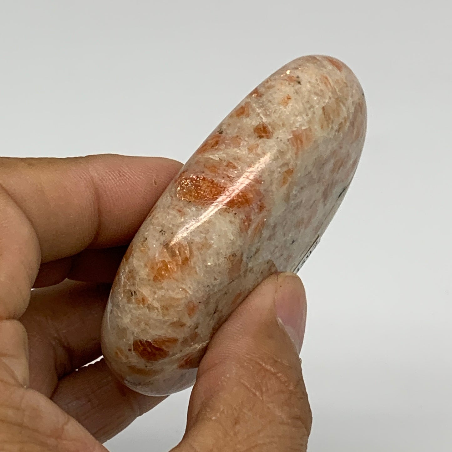 108.4g, 2.8"x1.8"x0.8", Natural Sunstone Palm-Stone Polished from India, B34597