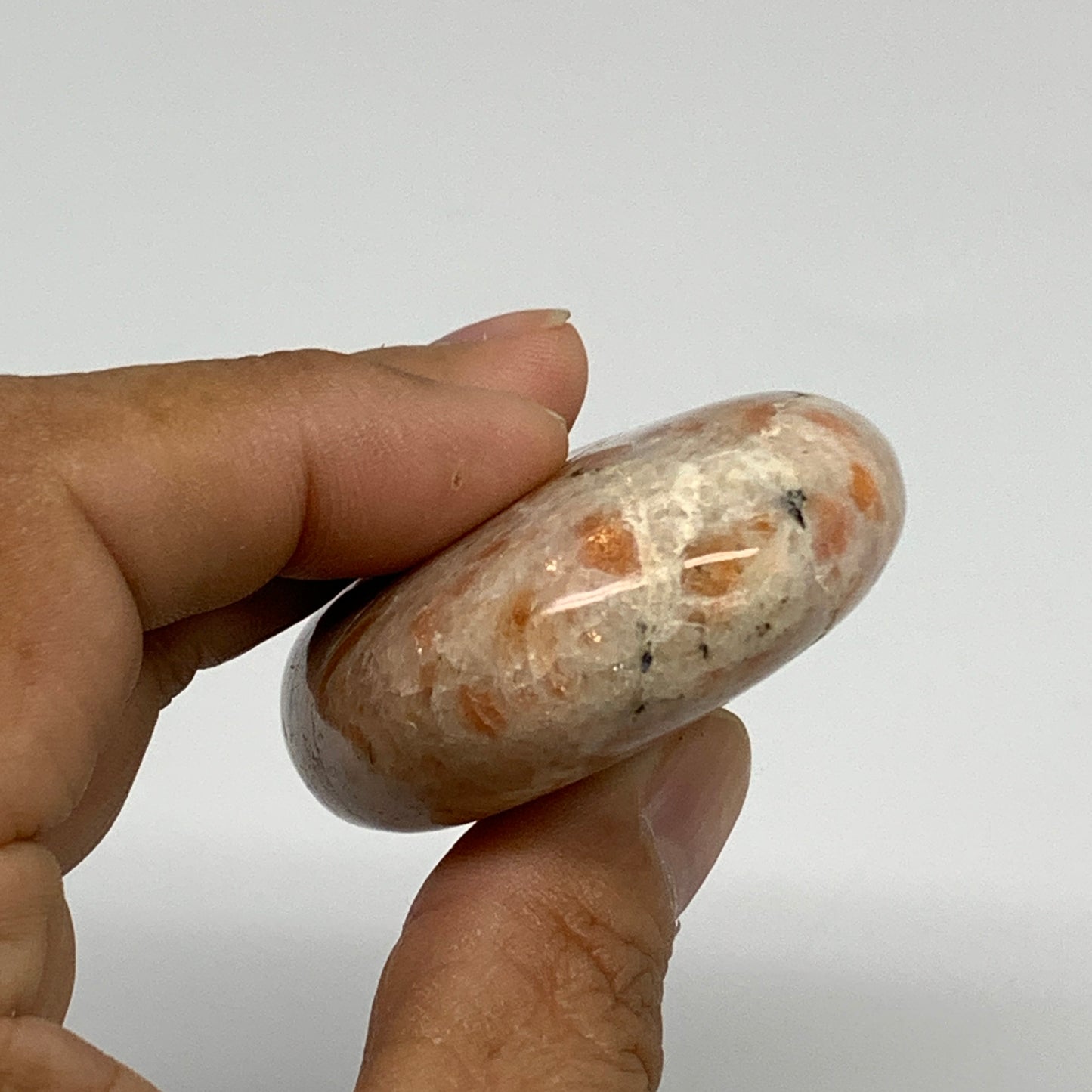 108.4g, 2.8"x1.8"x0.8", Natural Sunstone Palm-Stone Polished from India, B34597