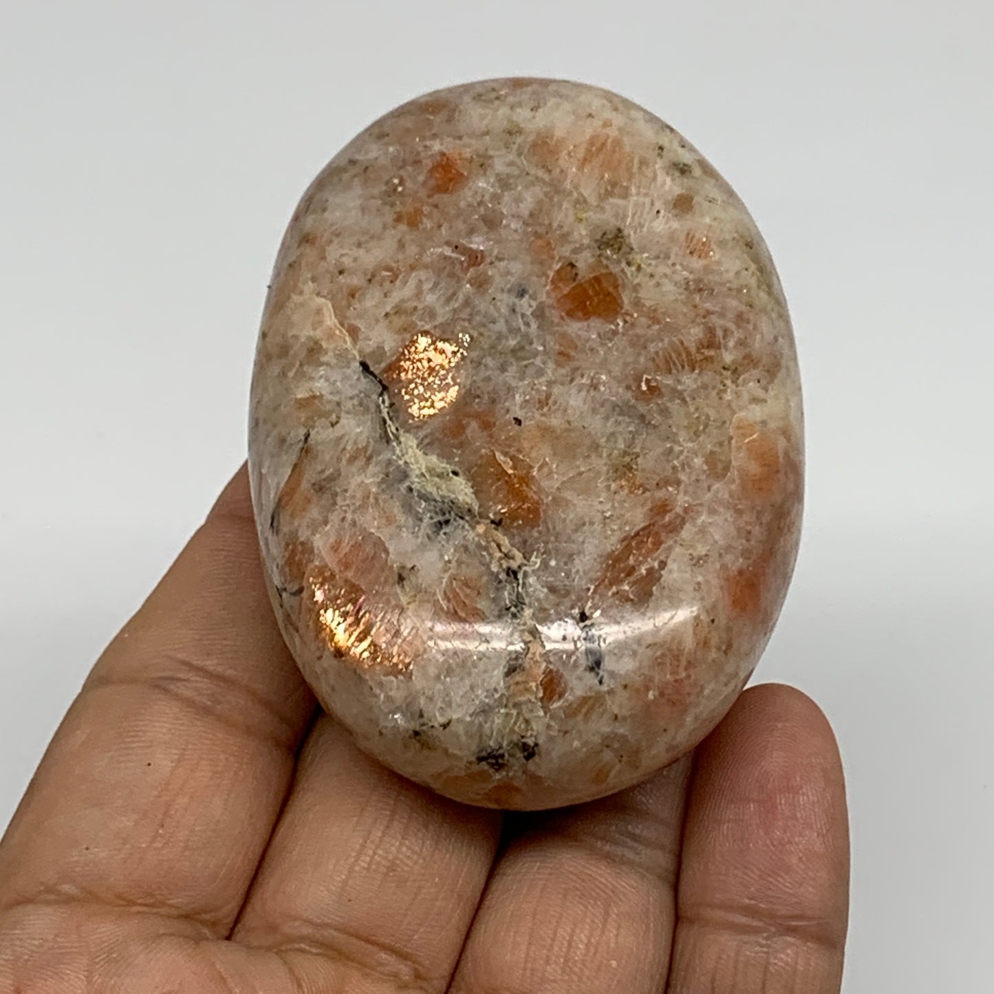 128.5g, 2.7"x1.9"x0.9", Natural Sunstone Palm-Stone Polished from India, B34599