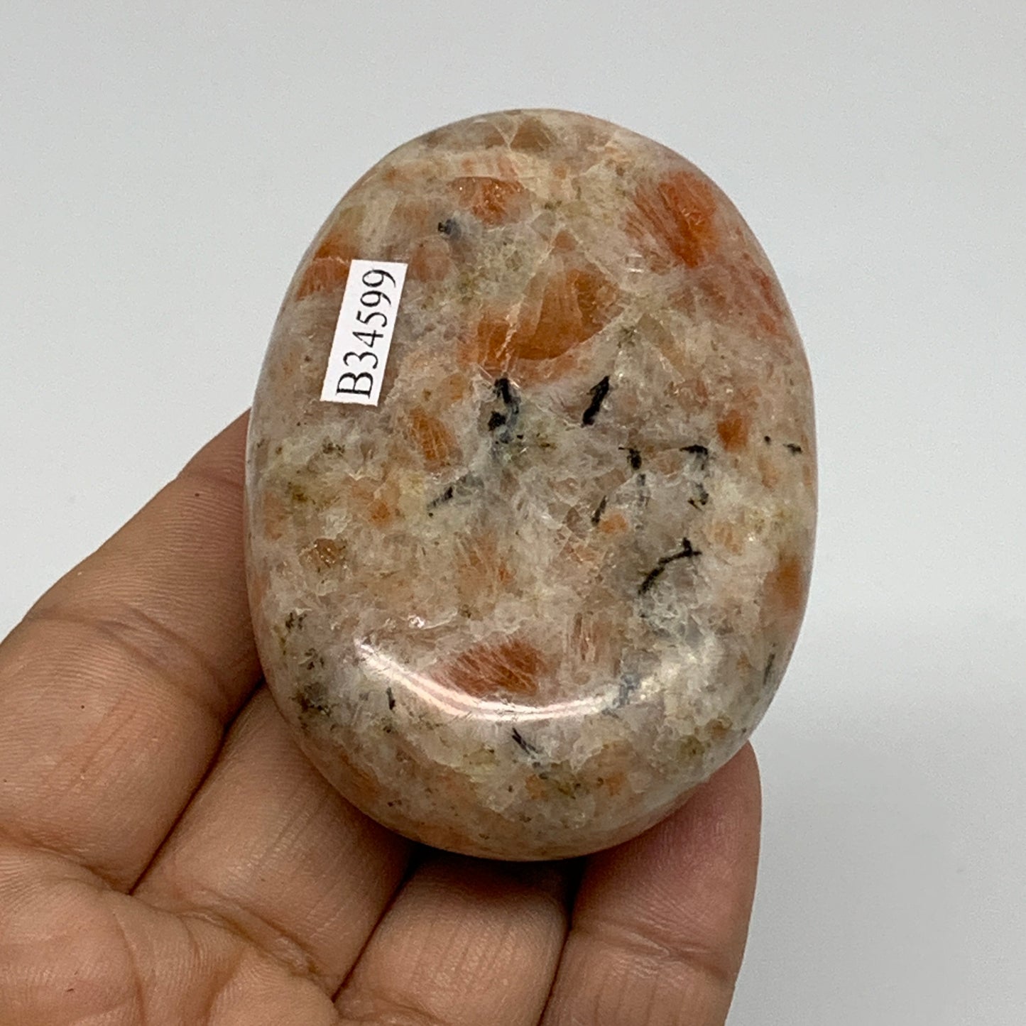 128.5g, 2.7"x1.9"x0.9", Natural Sunstone Palm-Stone Polished from India, B34599
