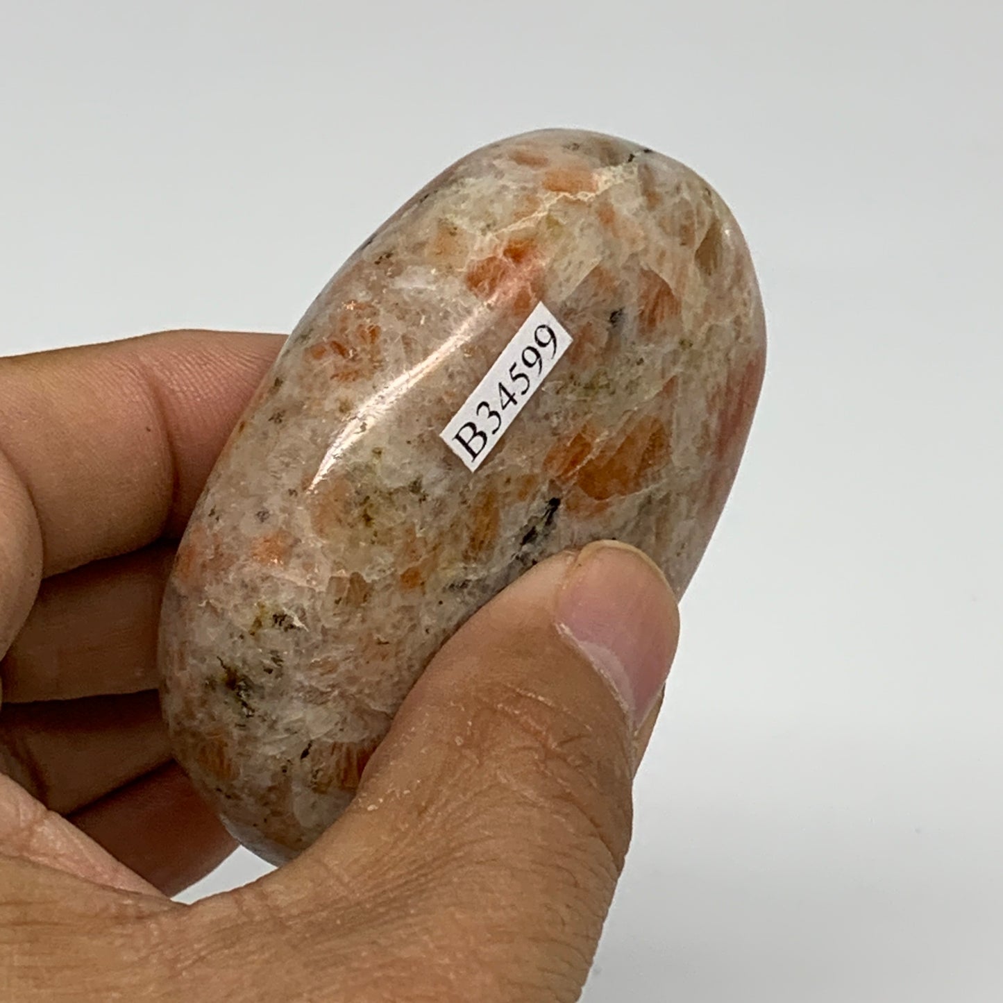 128.5g, 2.7"x1.9"x0.9", Natural Sunstone Palm-Stone Polished from India, B34599