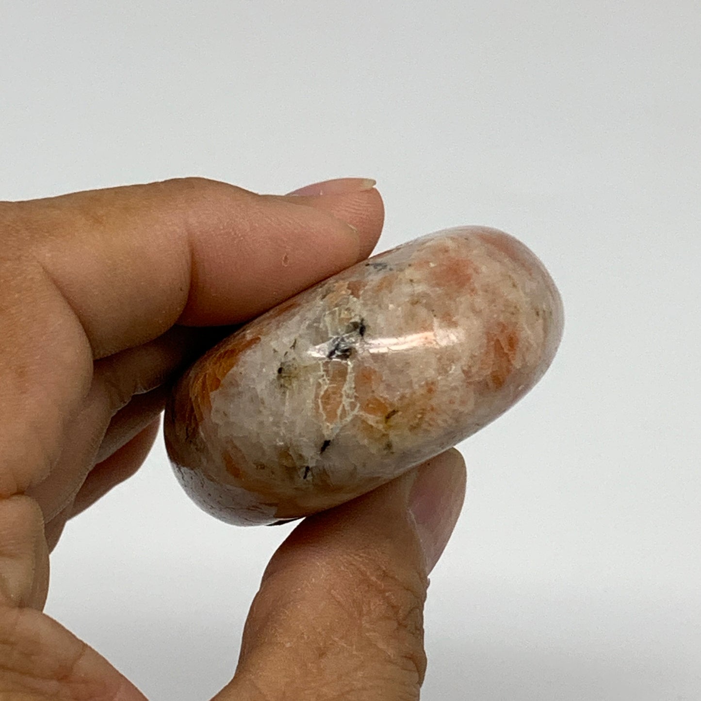 128.5g, 2.7"x1.9"x0.9", Natural Sunstone Palm-Stone Polished from India, B34599
