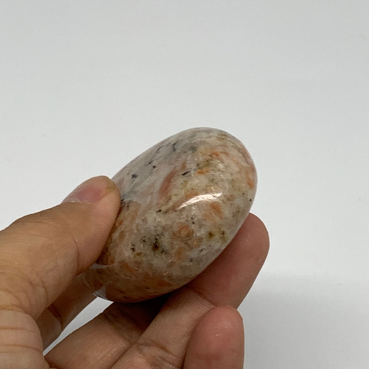 128.5g, 2.7"x1.9"x0.9", Natural Sunstone Palm-Stone Polished from India, B34599
